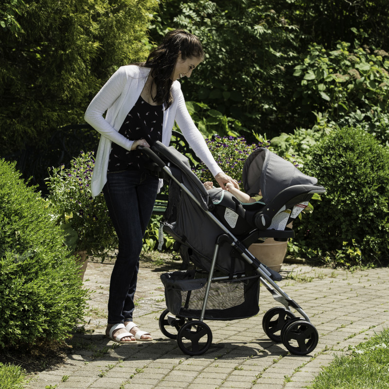 Vive™ Travel System with Embrace Infant Car Seat (Spearmint Spree) Lifestyle Photo Vive™ Travel System with Embrace Infant Car Seat (Spearmint Spree) Lifestyle Photo