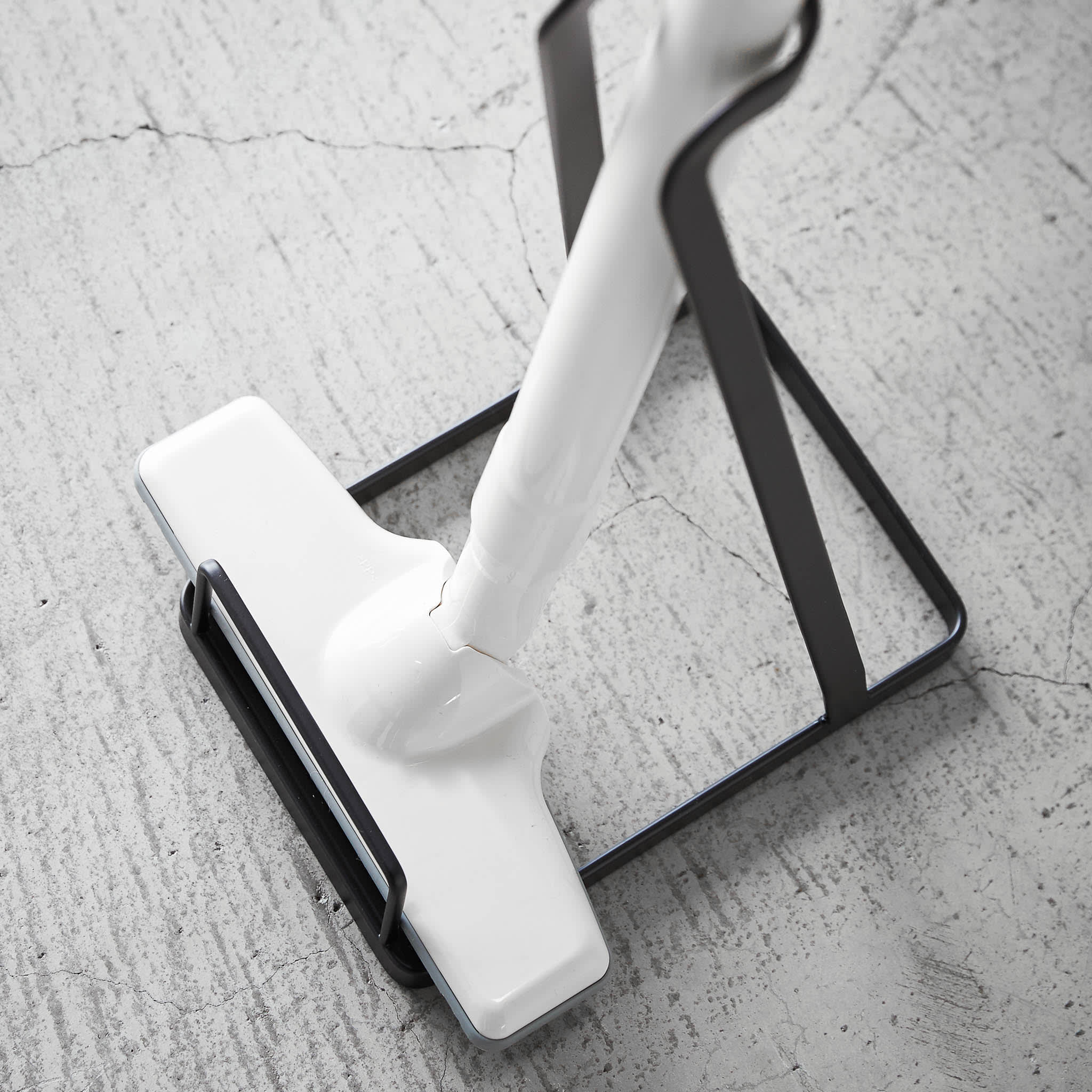 Staubsaugerständer : Kippschutz