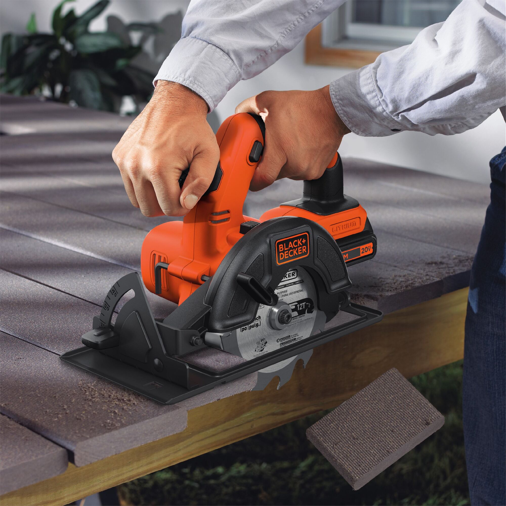 20 volt max Powerconnect cirtular saw being used by a person to cut hard material