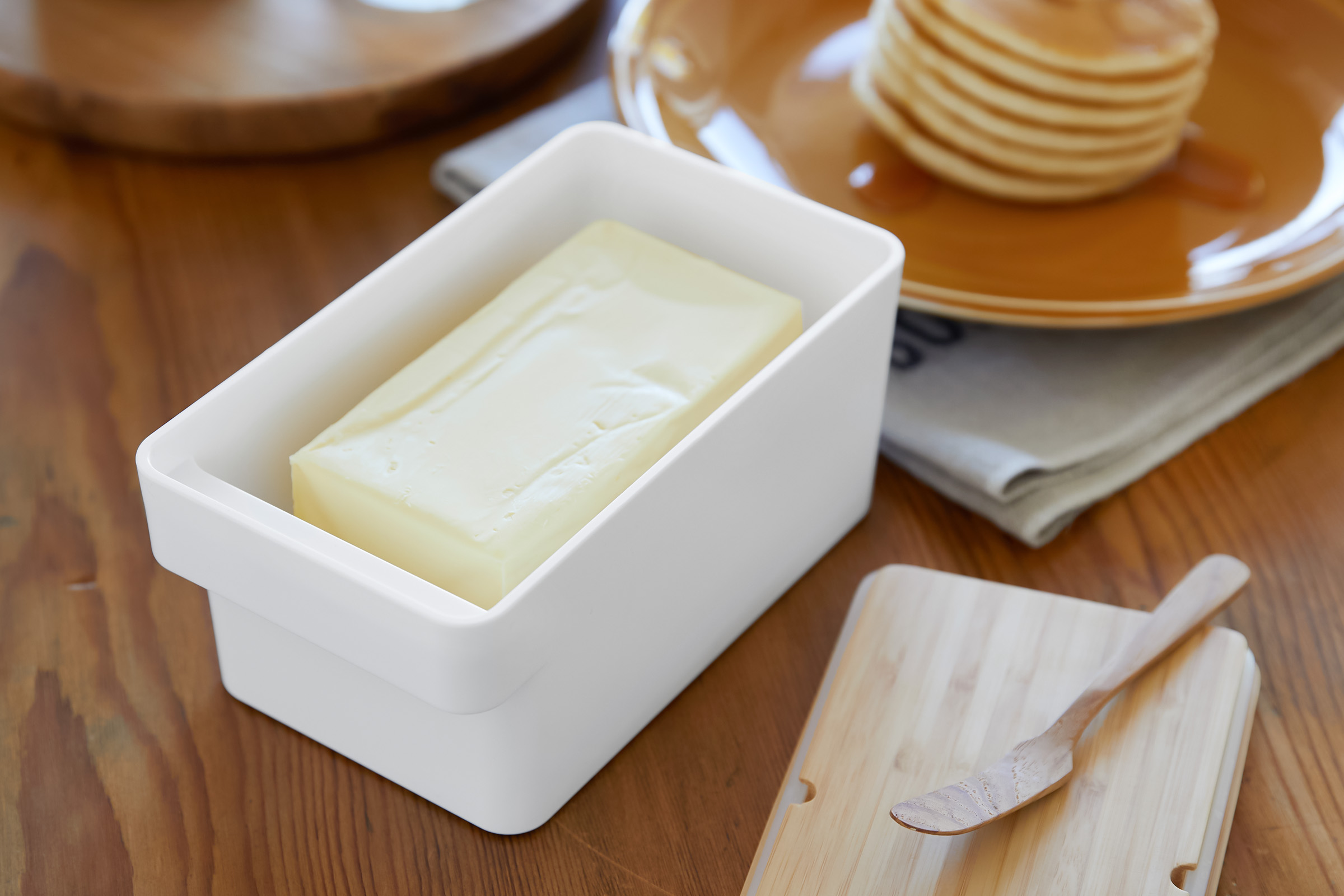 Yamazaki Butter Case opened on a dining table with butter inside