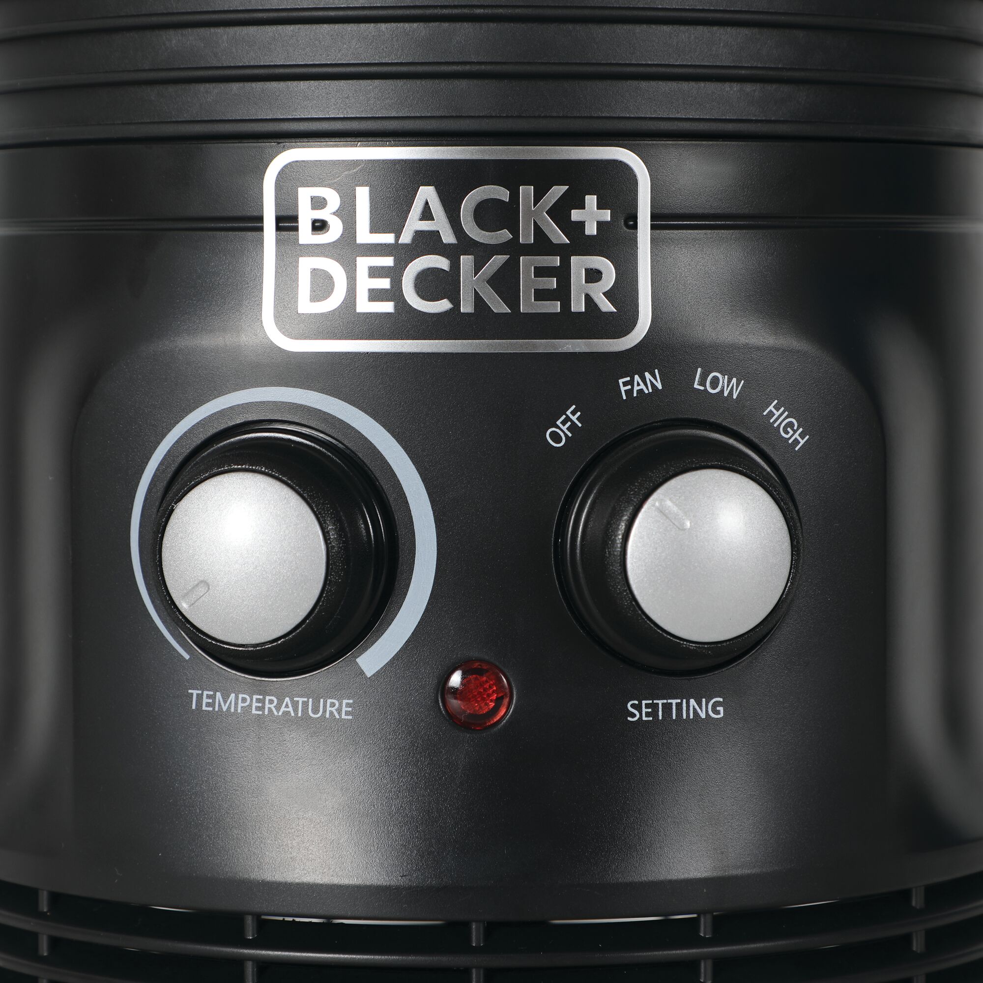 Close-up photo of the dial controls and LED indicator on the BLACK+DECKER Heater+Fan