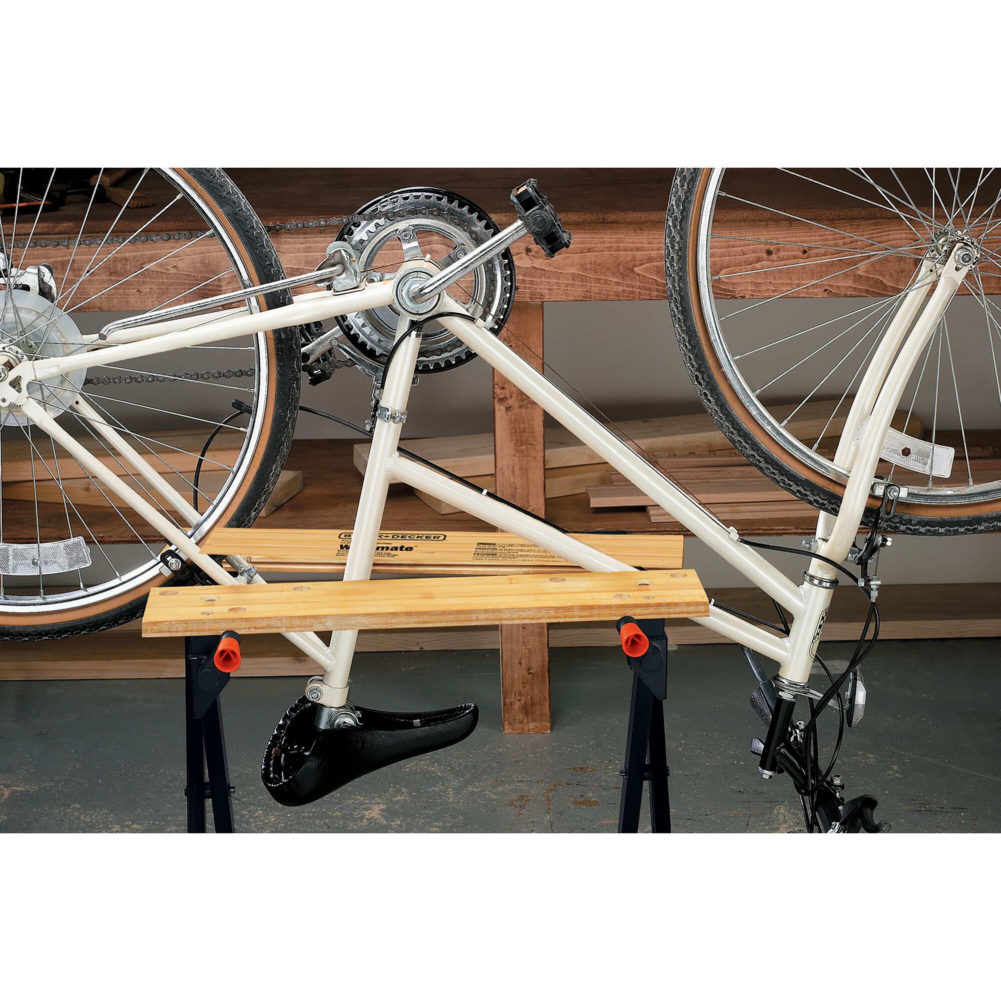Workmate Portable Project Center and Vise being used to hold an upside down bicycle for repair.