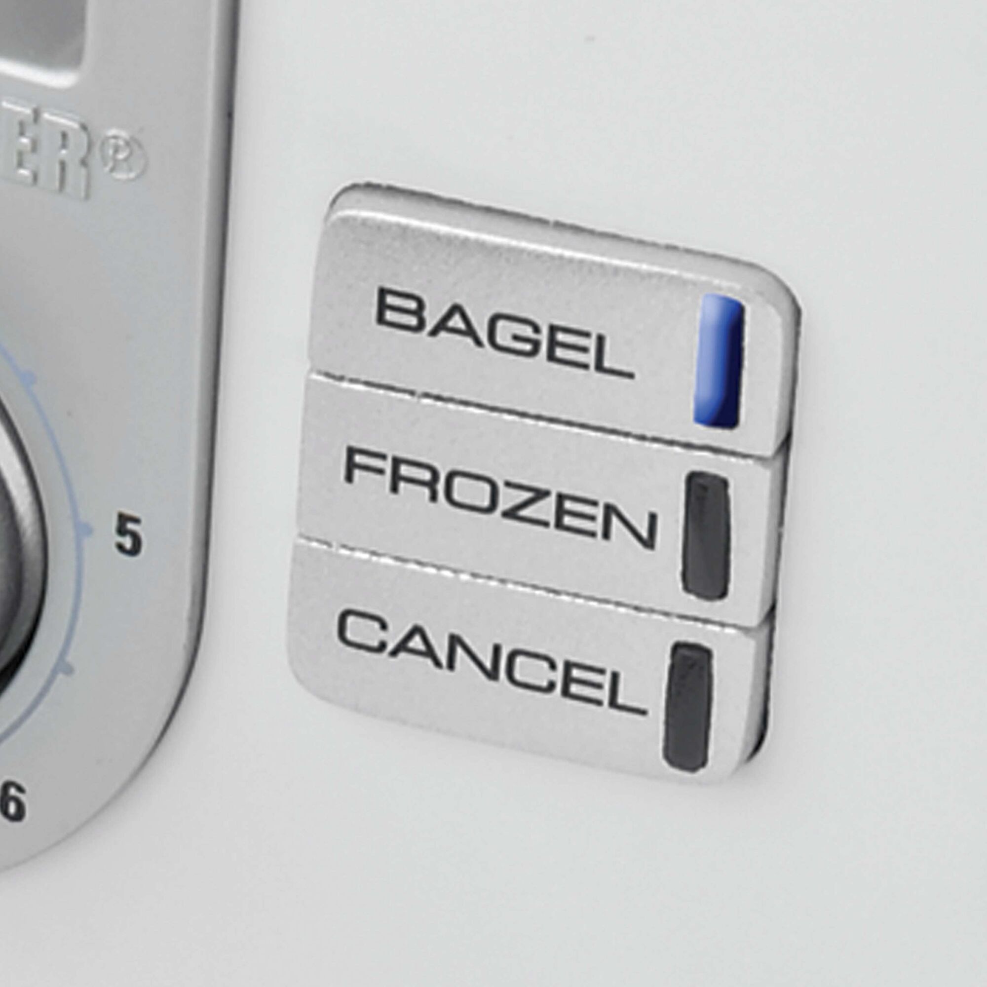 Close-up of toaster controls.