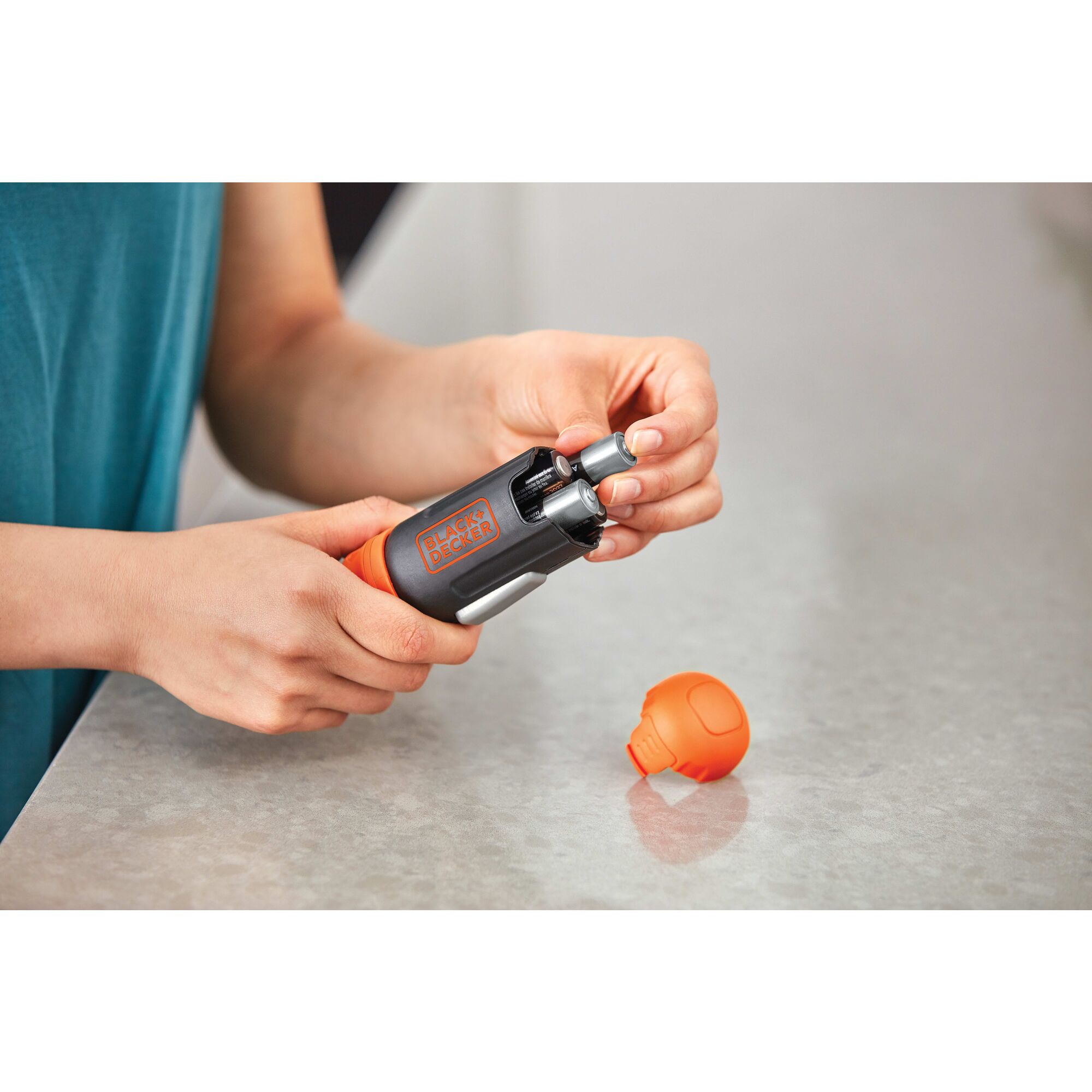 A A Battery feature of cordless power driver screwdriver with extensions shaft.