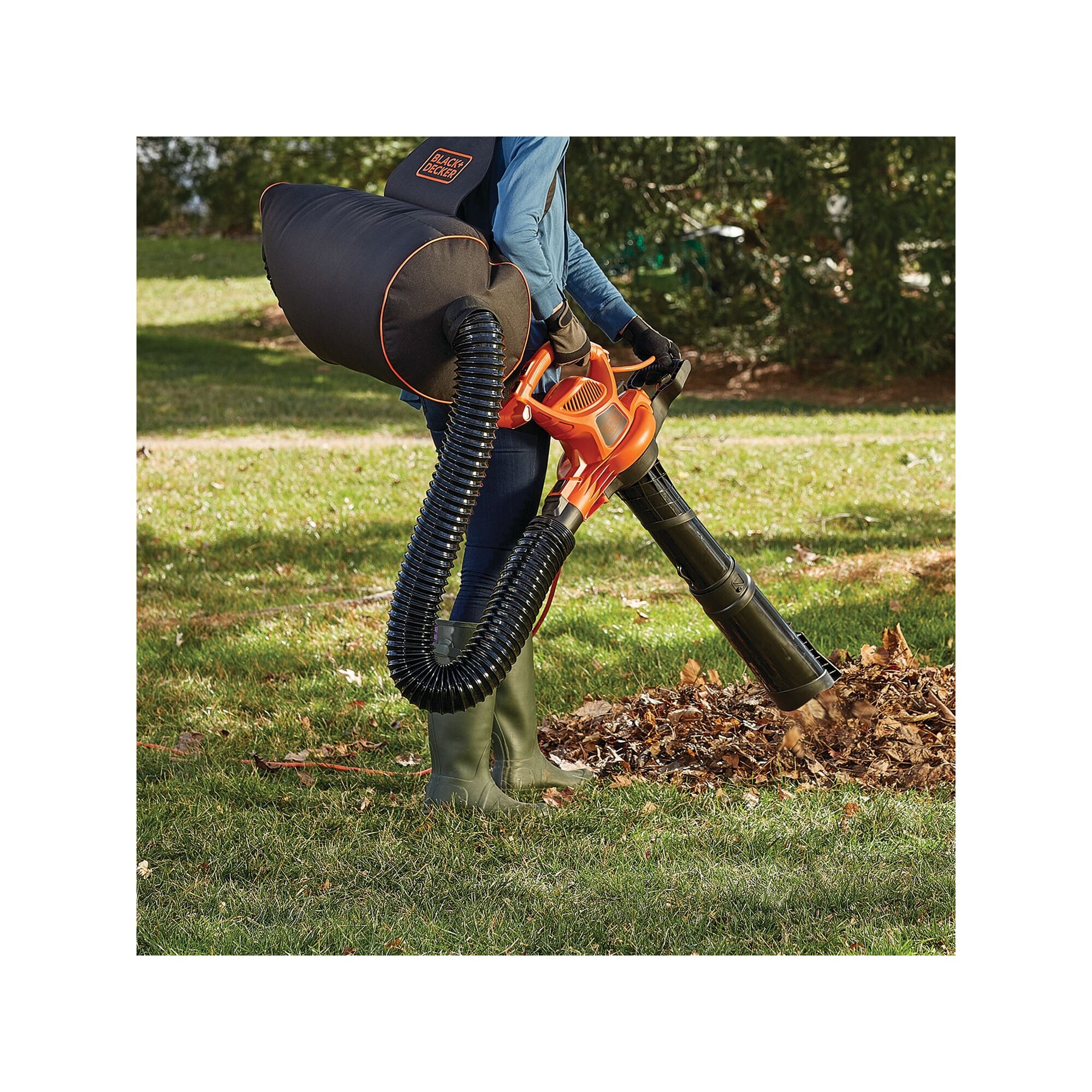 3 in 1 VAC PACK being used by person to collect dry leaves from park.