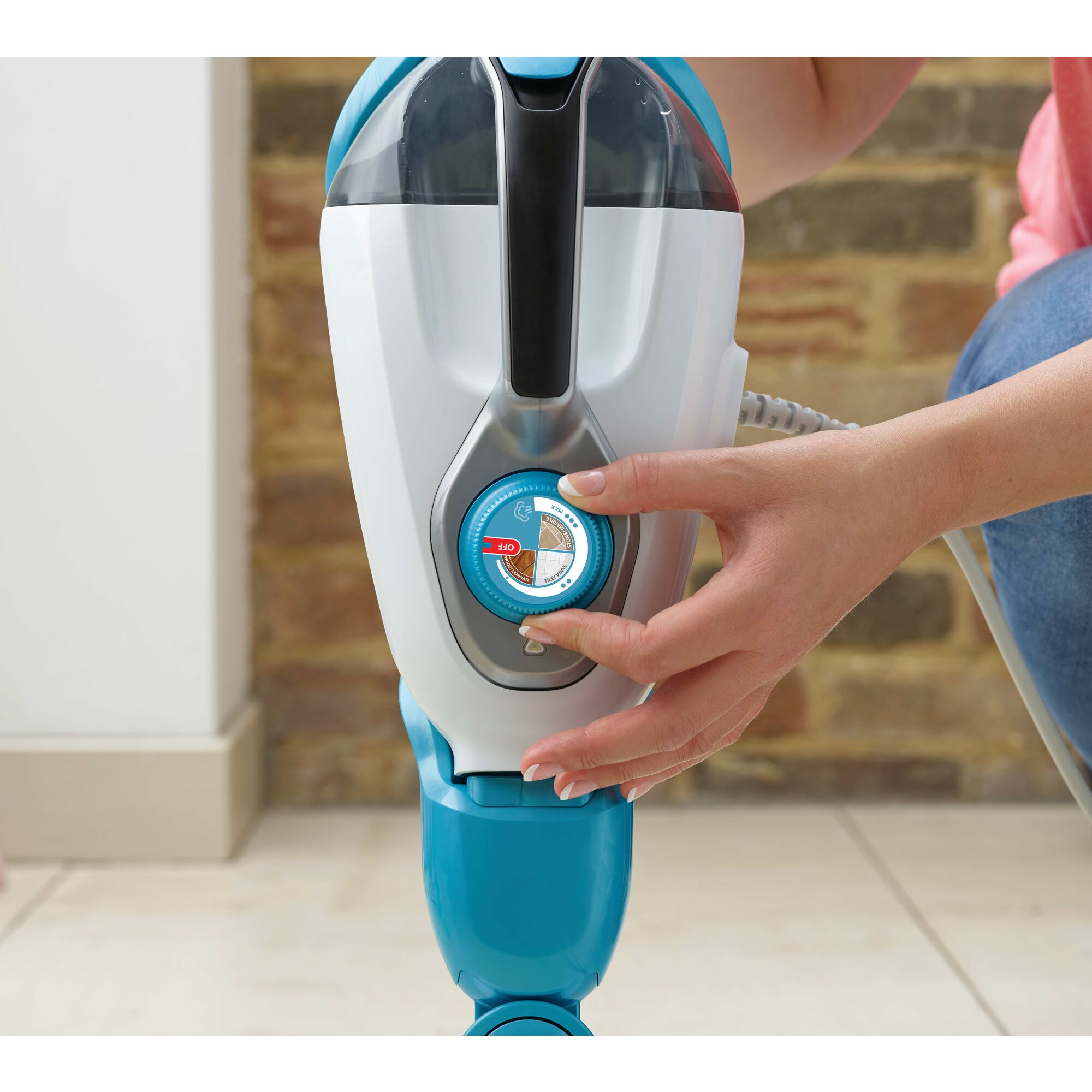 Adjustment knob to choose different modes in a 5 in 1 steam mop and portable steamer.