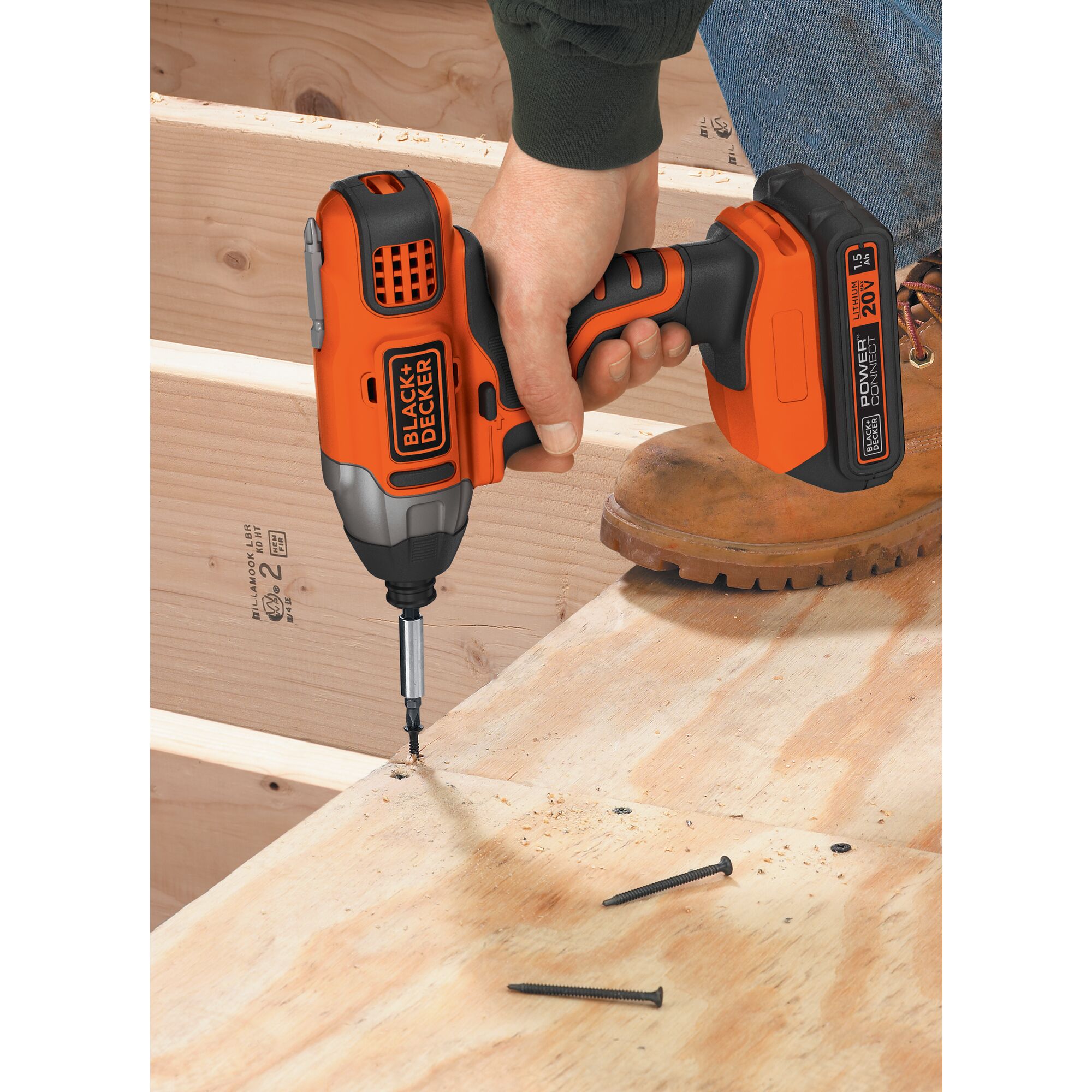 MAX Lithium Impact Driver being used to drive screw in wooden frame.