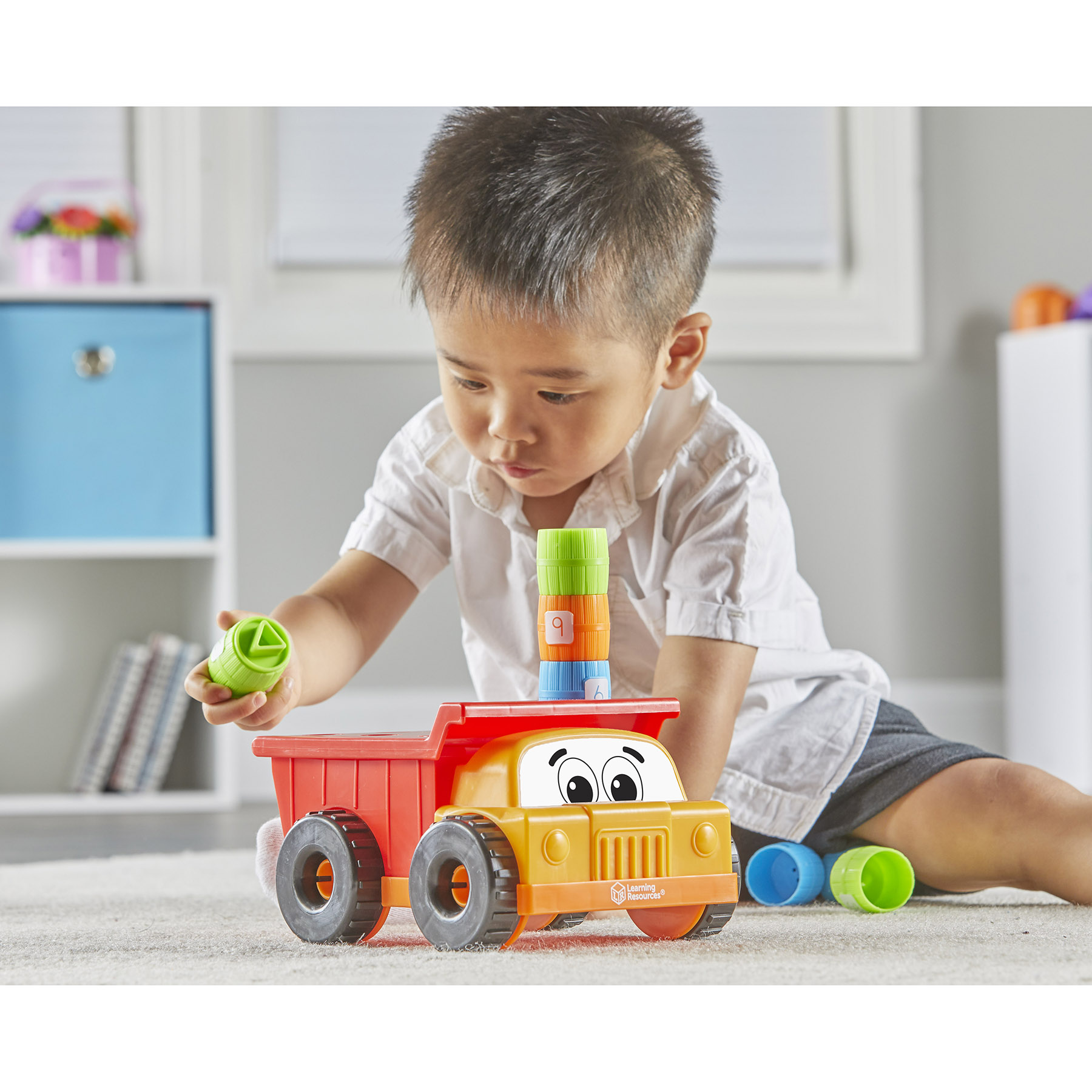Learning Resources Tony the Peg Stacker Dump Truck image number null