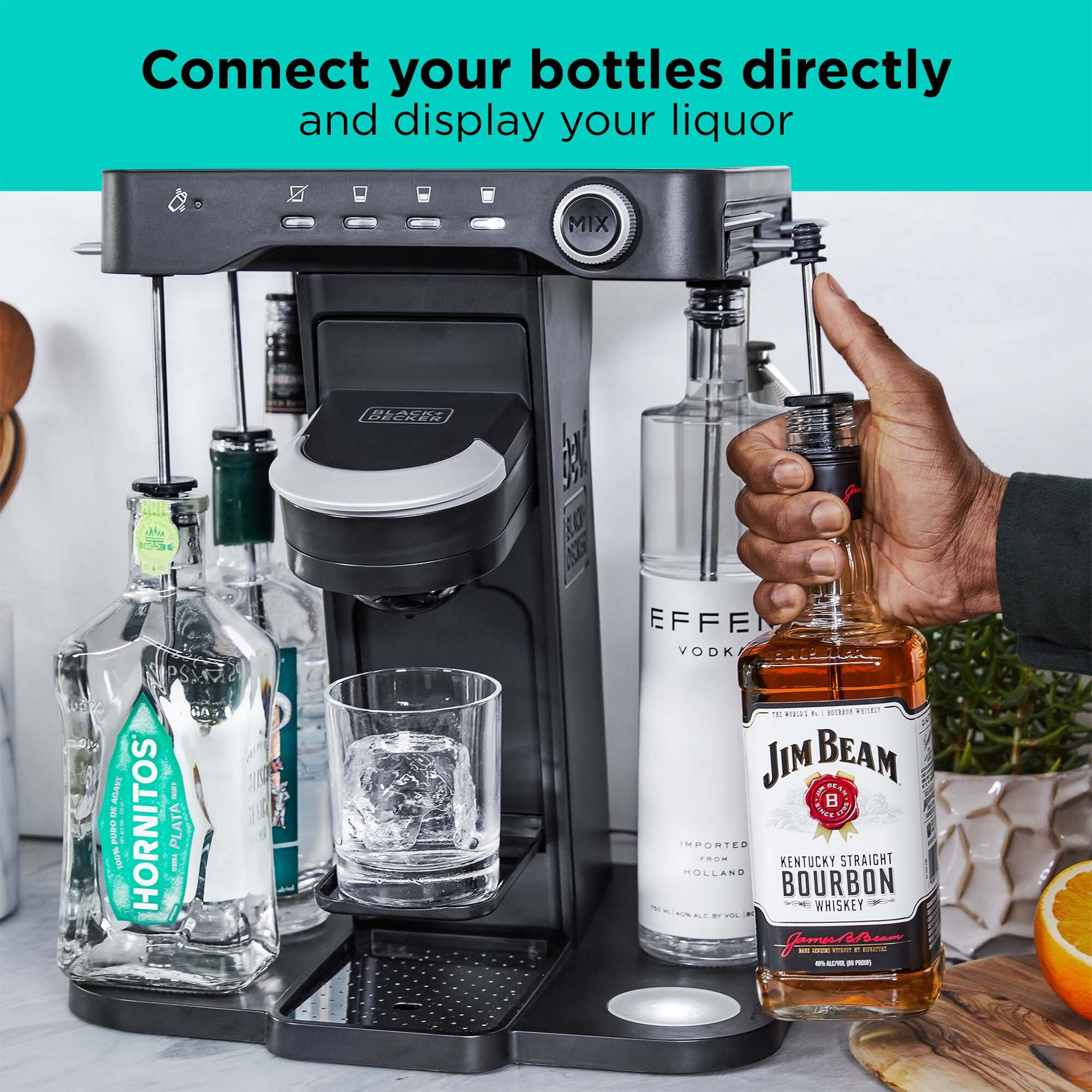 man loading a whiskey bottle on the bev by BLACK+DECKER\u2122 cocktail maker with text that reads 