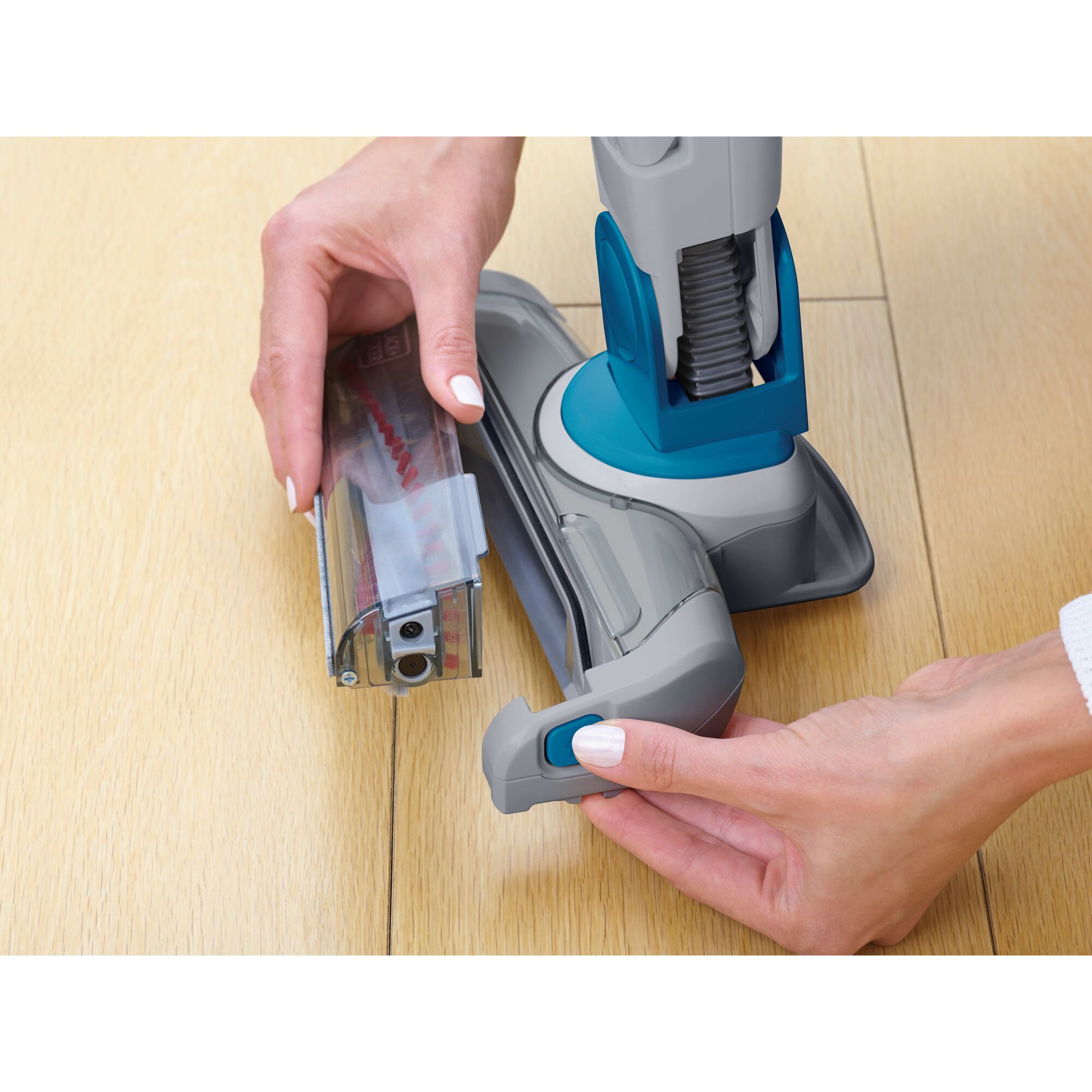 Cordless Lithium 2 in 1 Stick Vacuum Brush Attachment being connected.
