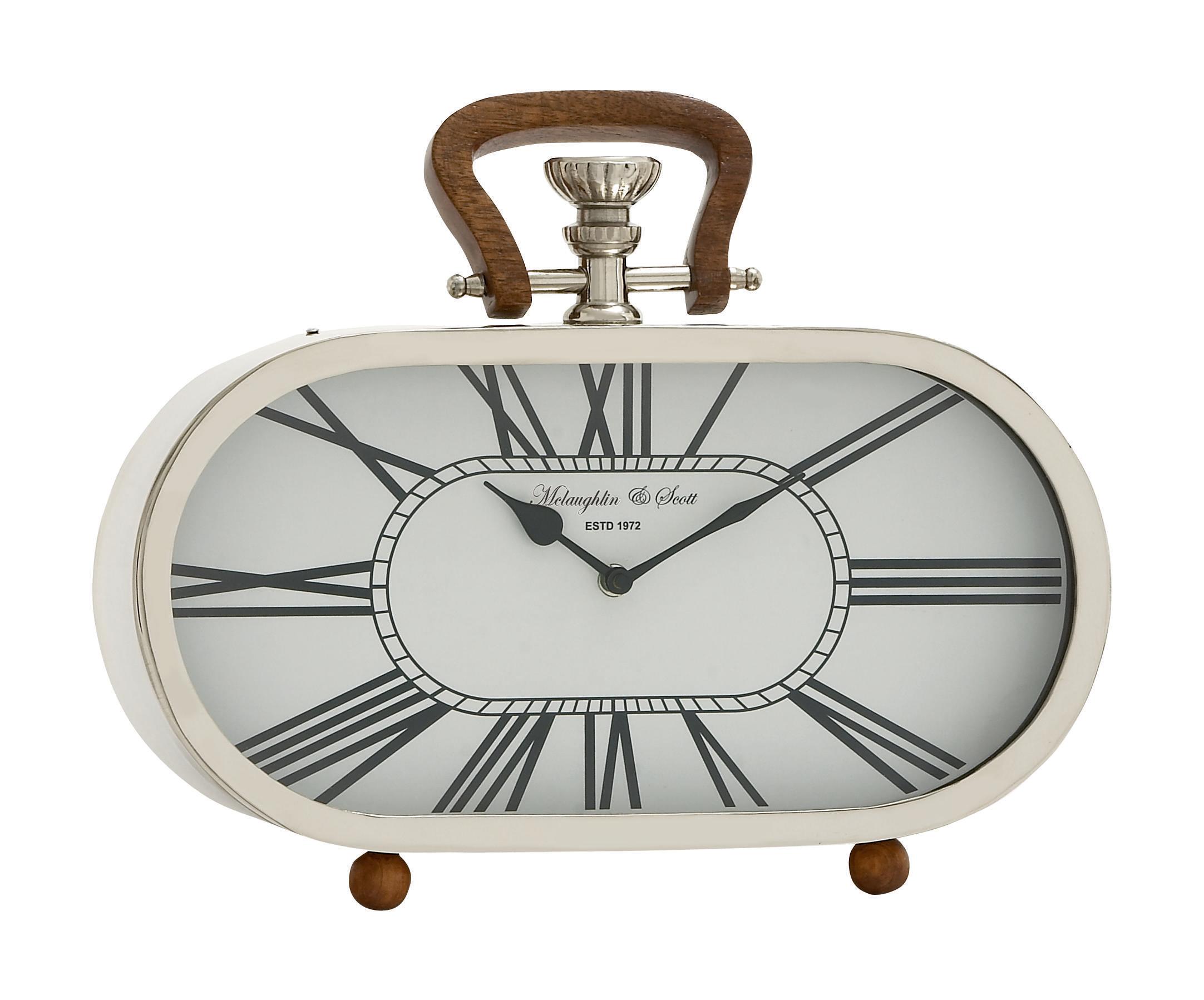 silver stainless steel metal  clock, 14" x 4" x 11"