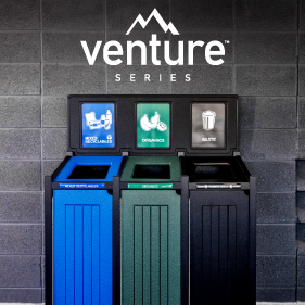 grey and white recycled plastic lumber mixed recyclables and waste container with sign frame and signs in a medical center