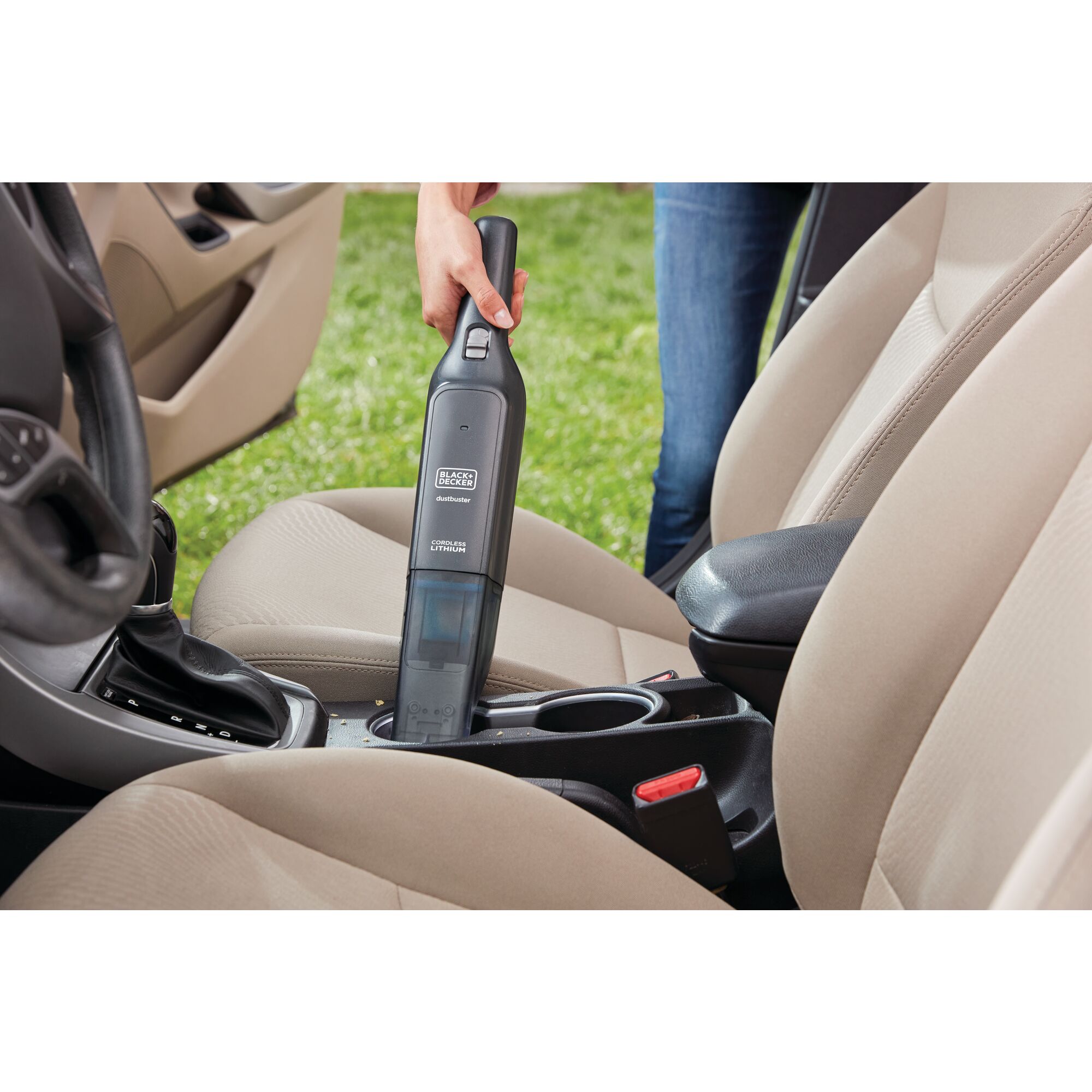 Dust buster 12 Volt Advanced Clean Cordless Hand Vacuum being used in car.
