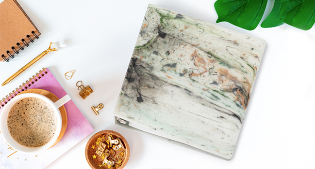 marble fashion binder on desk