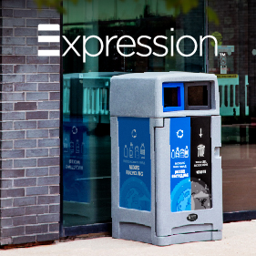 large grey recycling and waste container with dual openings hinged lockable door and large body sign outside at a recreation facility