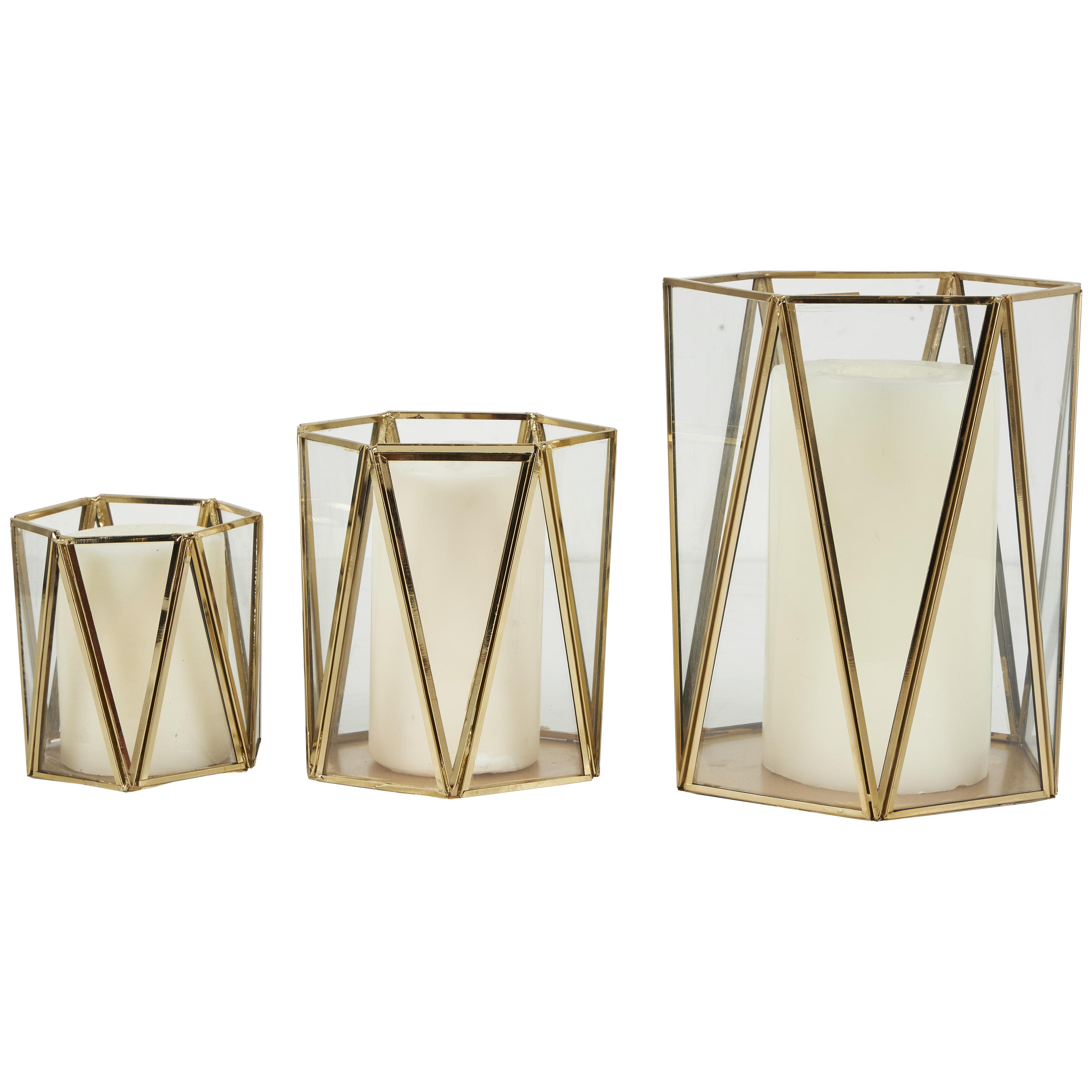 2 cosmoliving by cosmopolitan gold metal geometric triangle patterned hexagon indoor outdoor candle lantern with clear glass, set of 3 9\", 6\", 5\"h