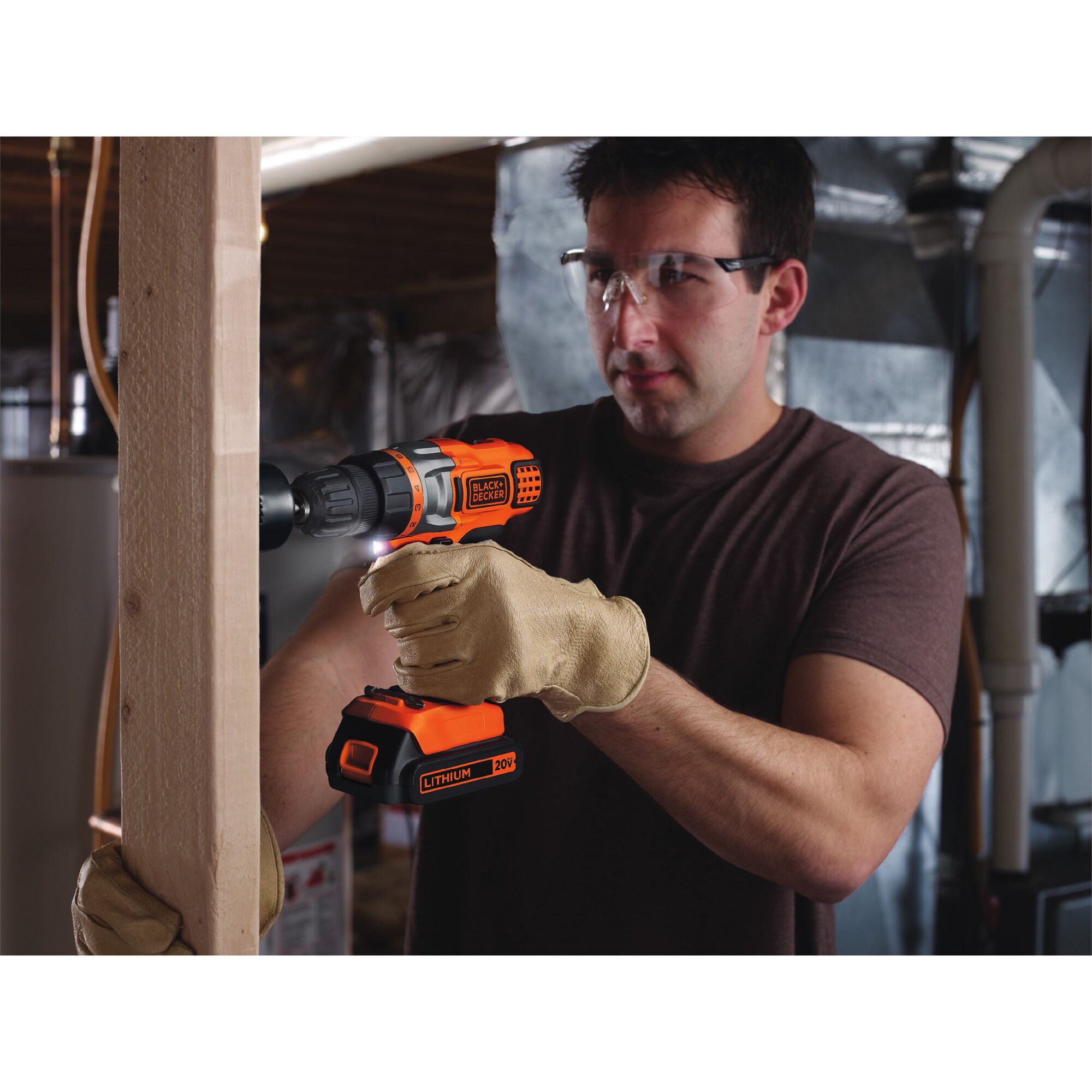 Person using 20 volt max Powerconnect cordless drill driver to drive a screw into a wooden stud