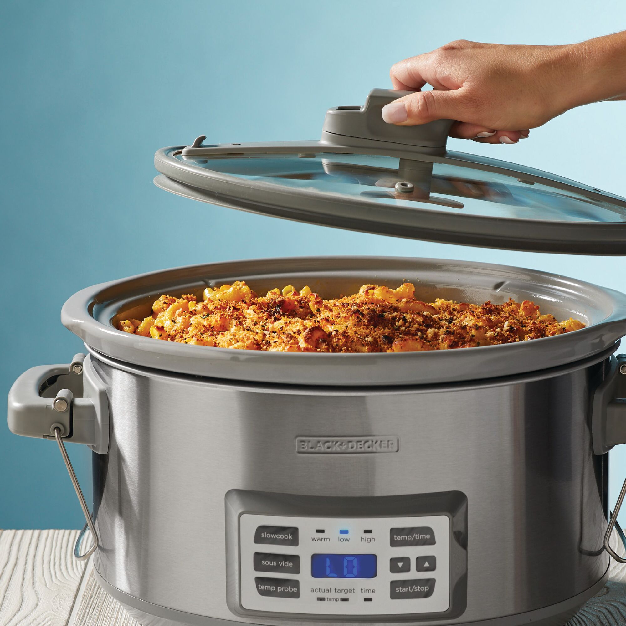 7 Quart Digital Slow Cooker with Temperature Probe + Precision Sous Vide being used to cook food.