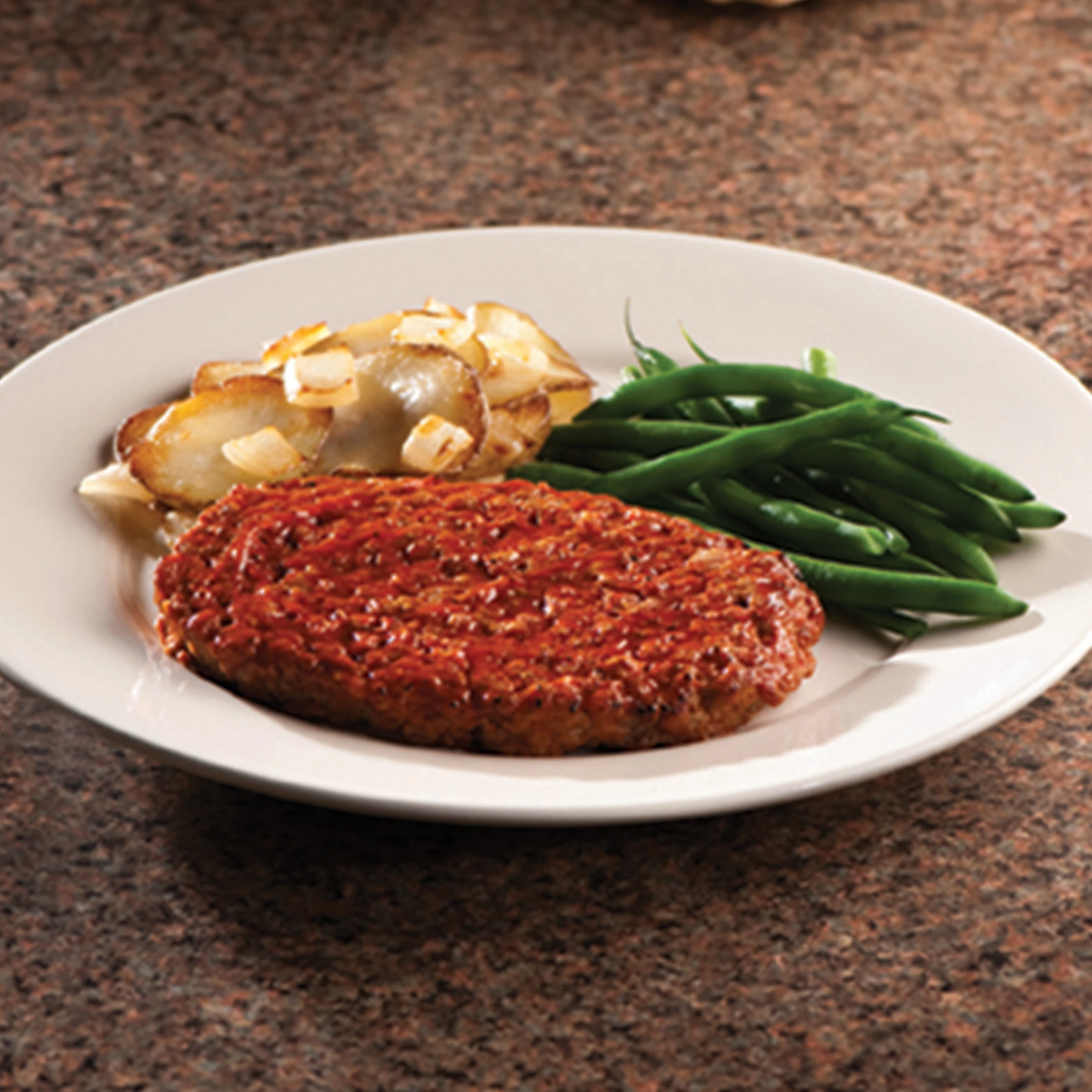 AdvancePierre® Fully Cooked Glazed with Ketchup Beef with Onion, Bell Pepper and Spices Meatloaf Patty, 6 oz, Approx. 30 Pieces, 11.25 Lbshttp://images.salsify.com/image/upload/s--CX4F2JhV--/qviyoqzszihhsta2bx41.webp