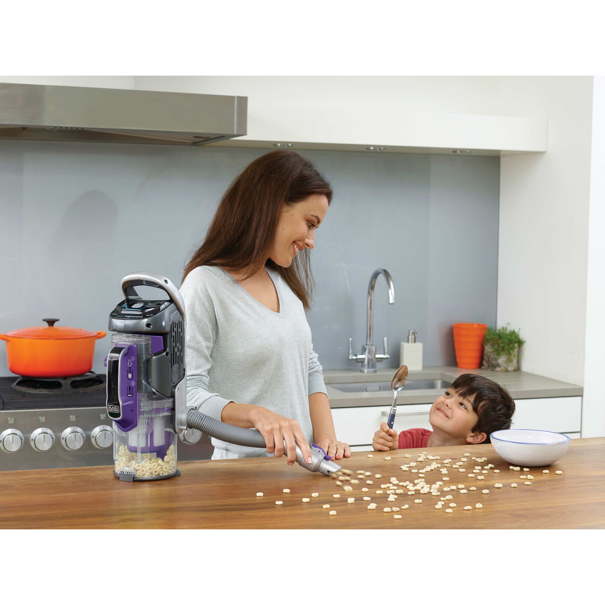 power series pro cordless 2 in 1 pet vacuum being used by a person.