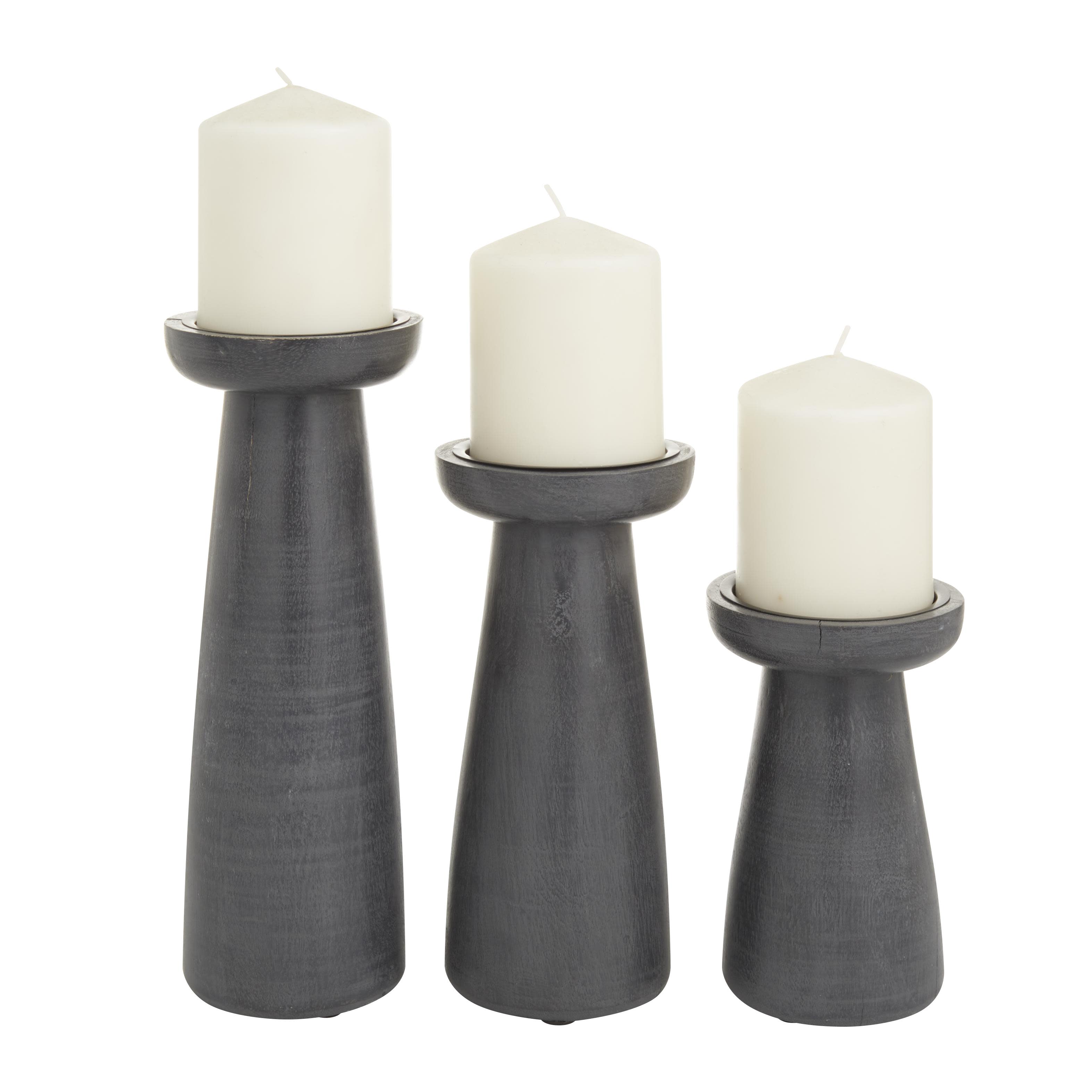 cosmoliving by cosmopolitan dark gray mango wood  pillar decorative candle holder, set of 3 10", 8", 6"h