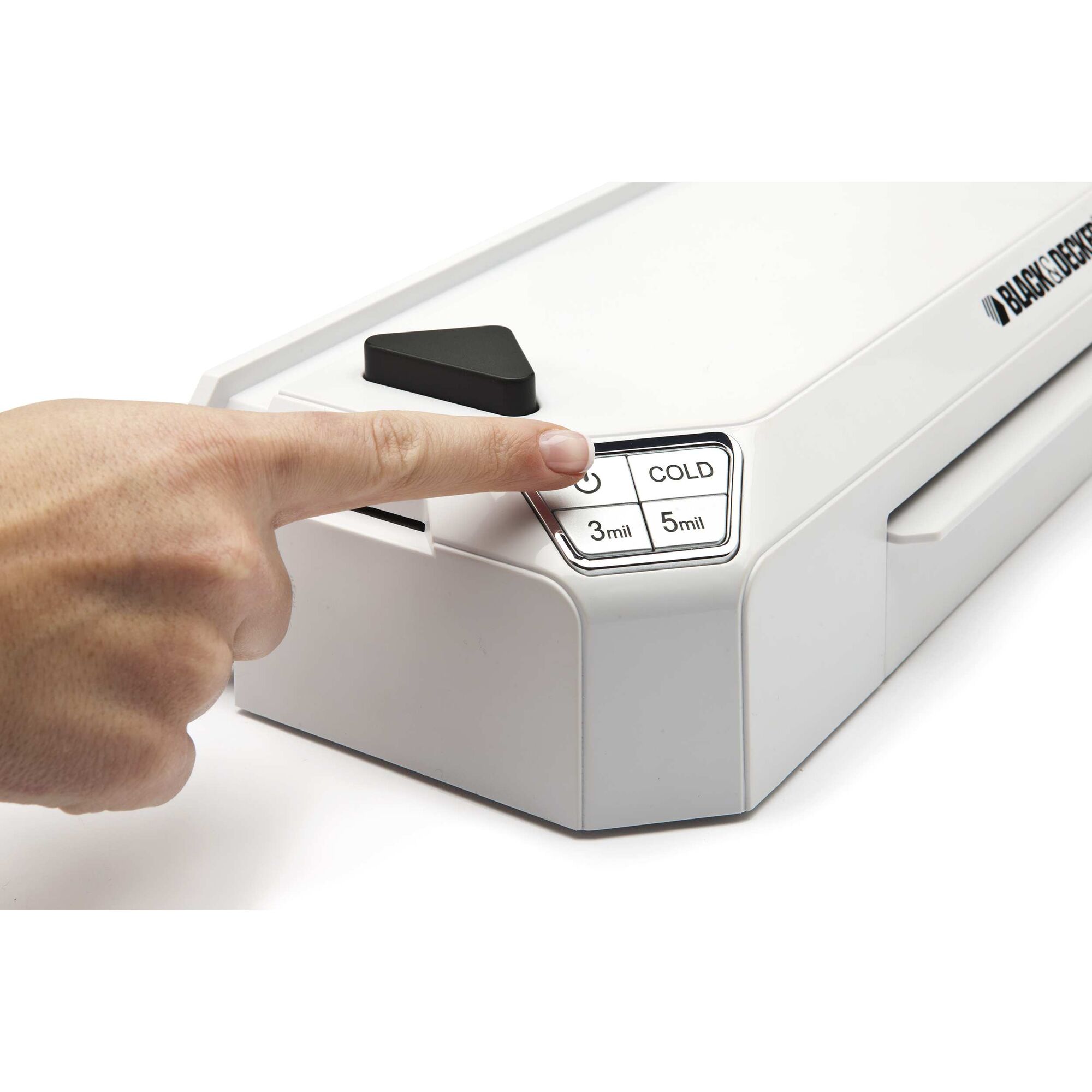 Flash 9.5 inch thermal laminator being turned on by a person.