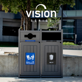 double waste and recycling bin made from recycled plastics with a mixed restrictive opening sitting on the boardwalk at the beach