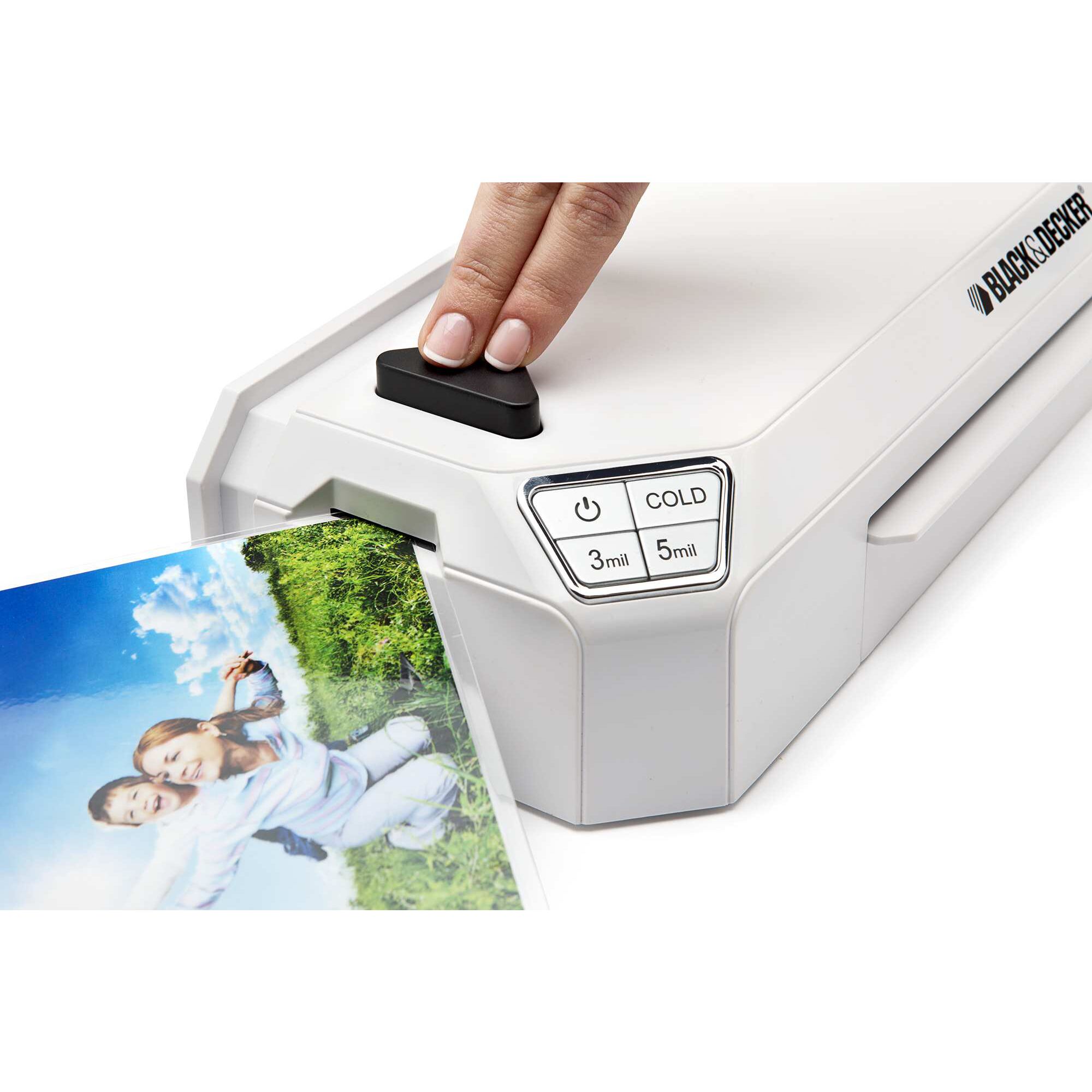 Flash 9 and 5 tenths inch Thermal Laminator being used to laminate photograph.