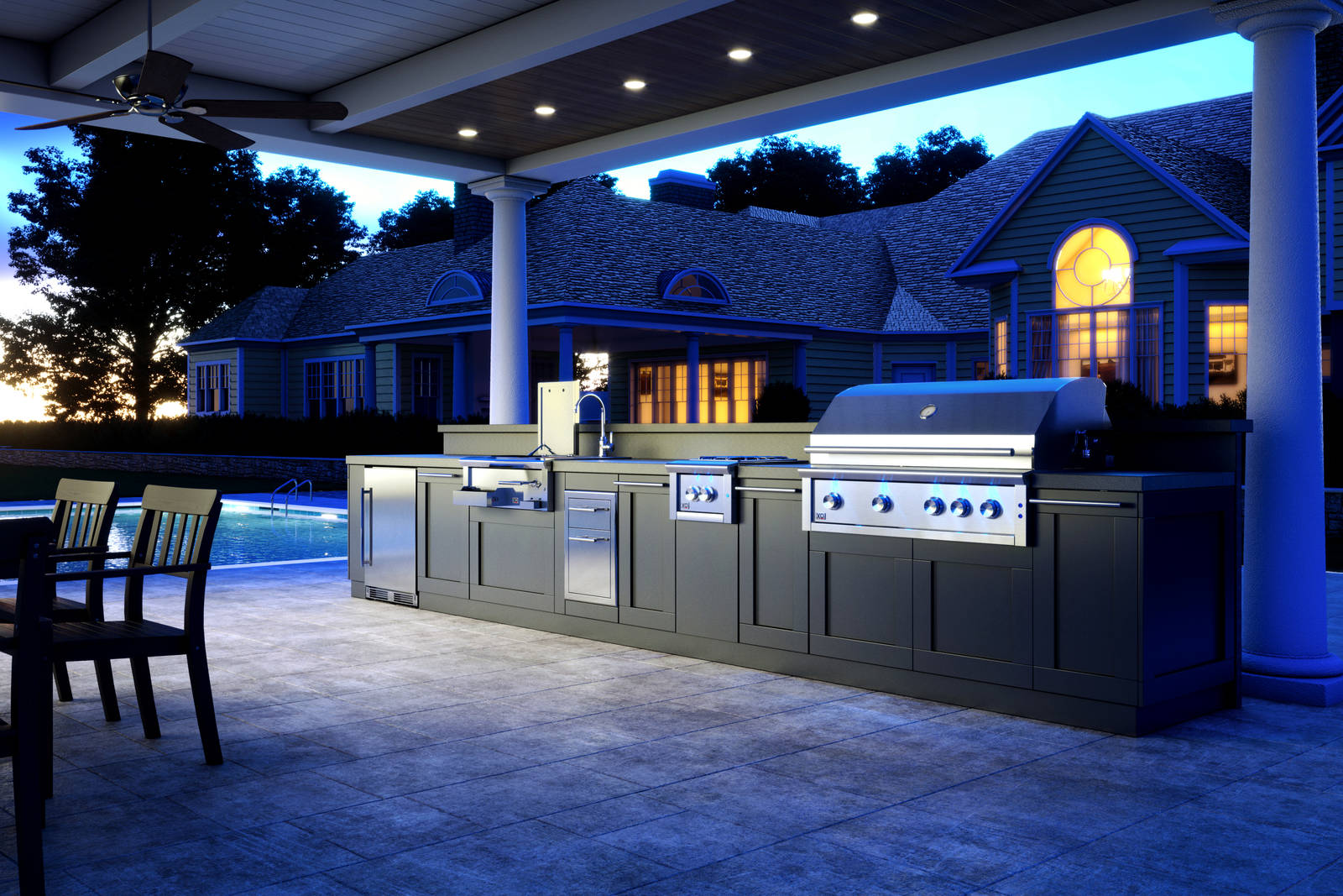 XO outdoor kitchen in the Hamptons at night