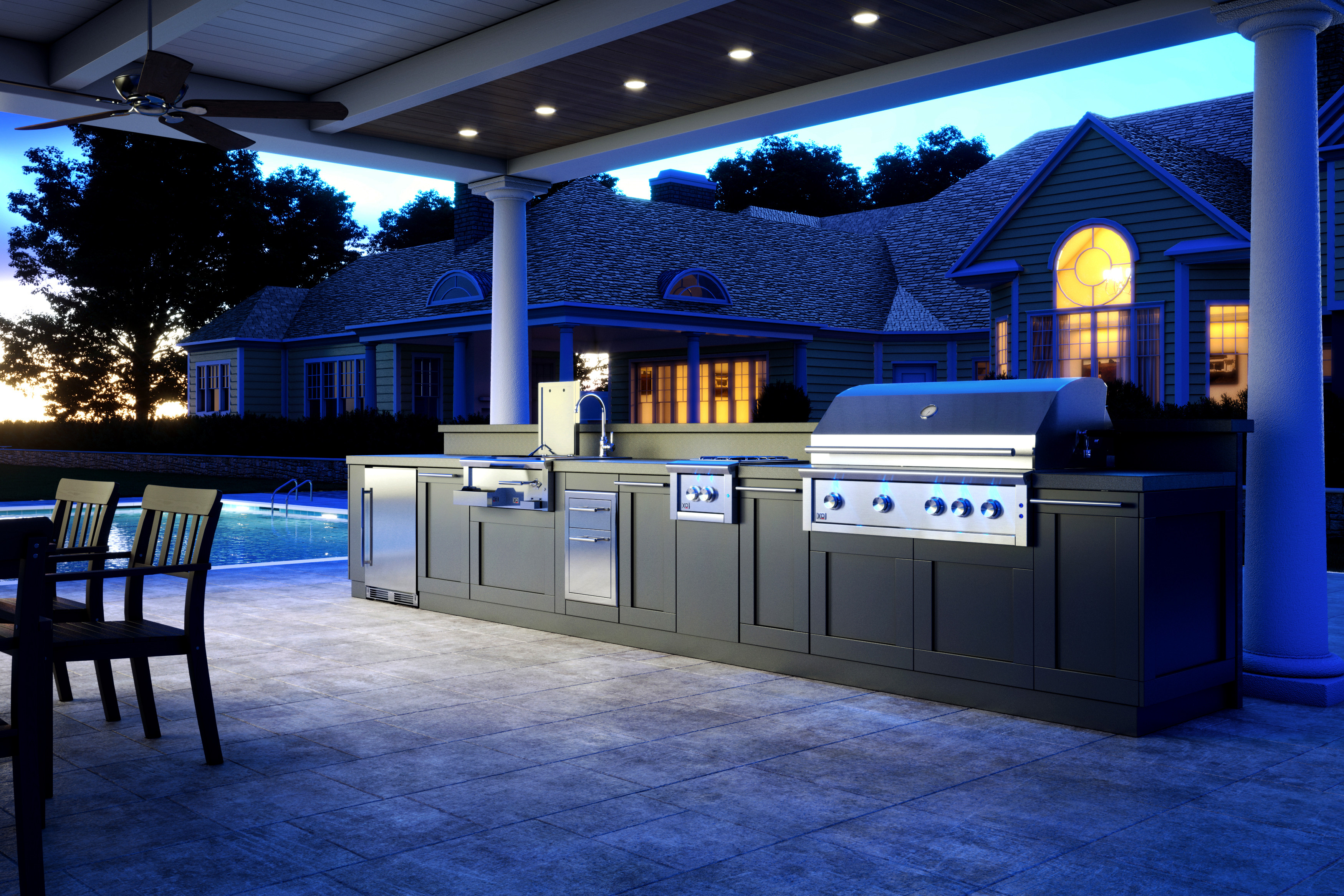 XO outdoor kitchen in the Hamptons at night