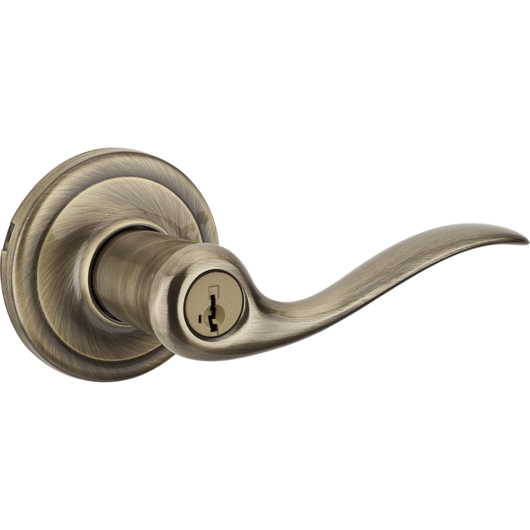 Tustin Keyed Vestibule Lever featuring SmartKey Security™ in Antique Brass