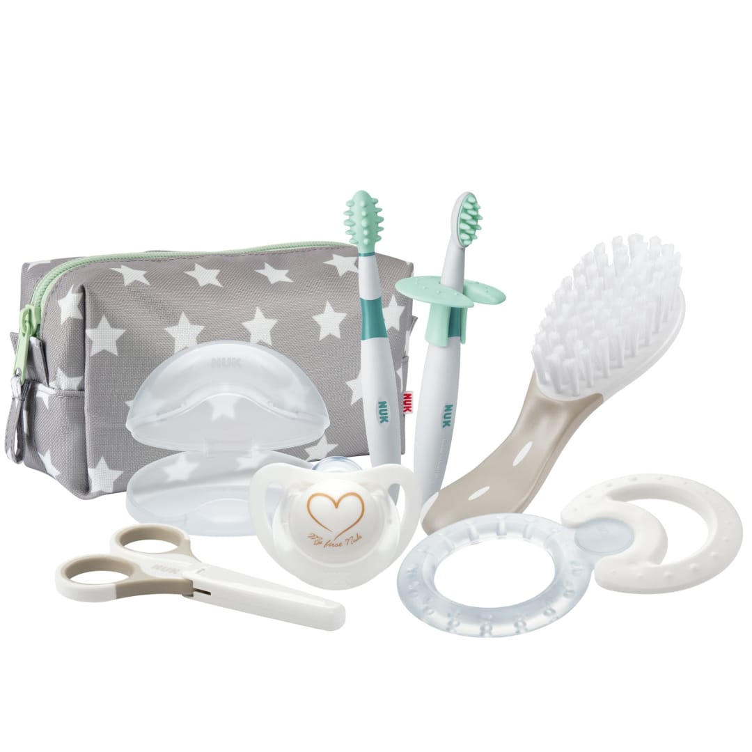 NUK® Trousse de toilette bébé avec sucette, brosse , brosse a dent, anneau de dentition et ciseaux