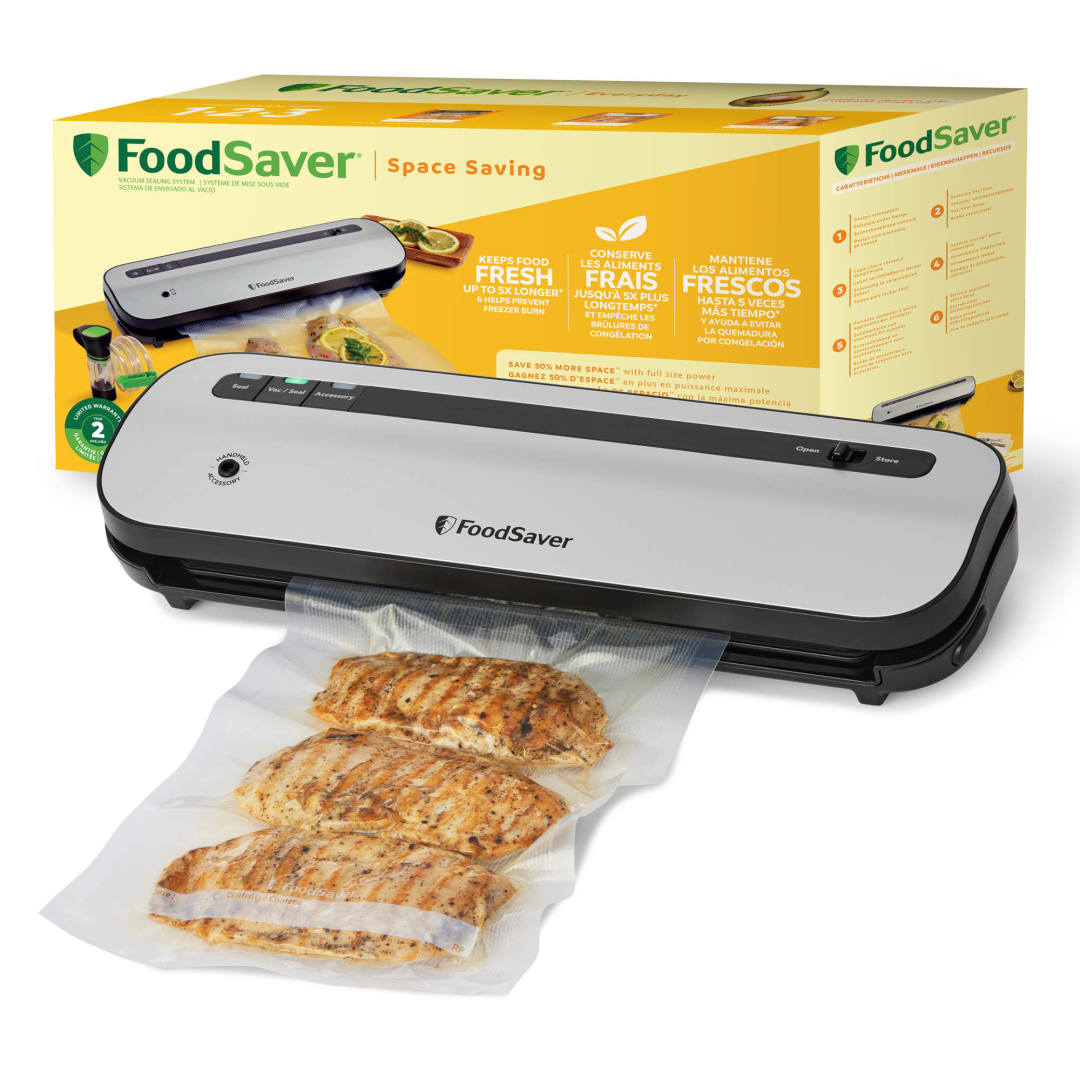 FoodSaver Space Saving Vacuum Sealer Machine | Keeps Food Fresh Up to 5x Longer* | Saves 50% More Space** | 1 x Roll (28 cm x 2.43 m), 2 x Sealing Bags (0.94 L), 2 x Zipper Bags (0.94 L) | VS1290X
