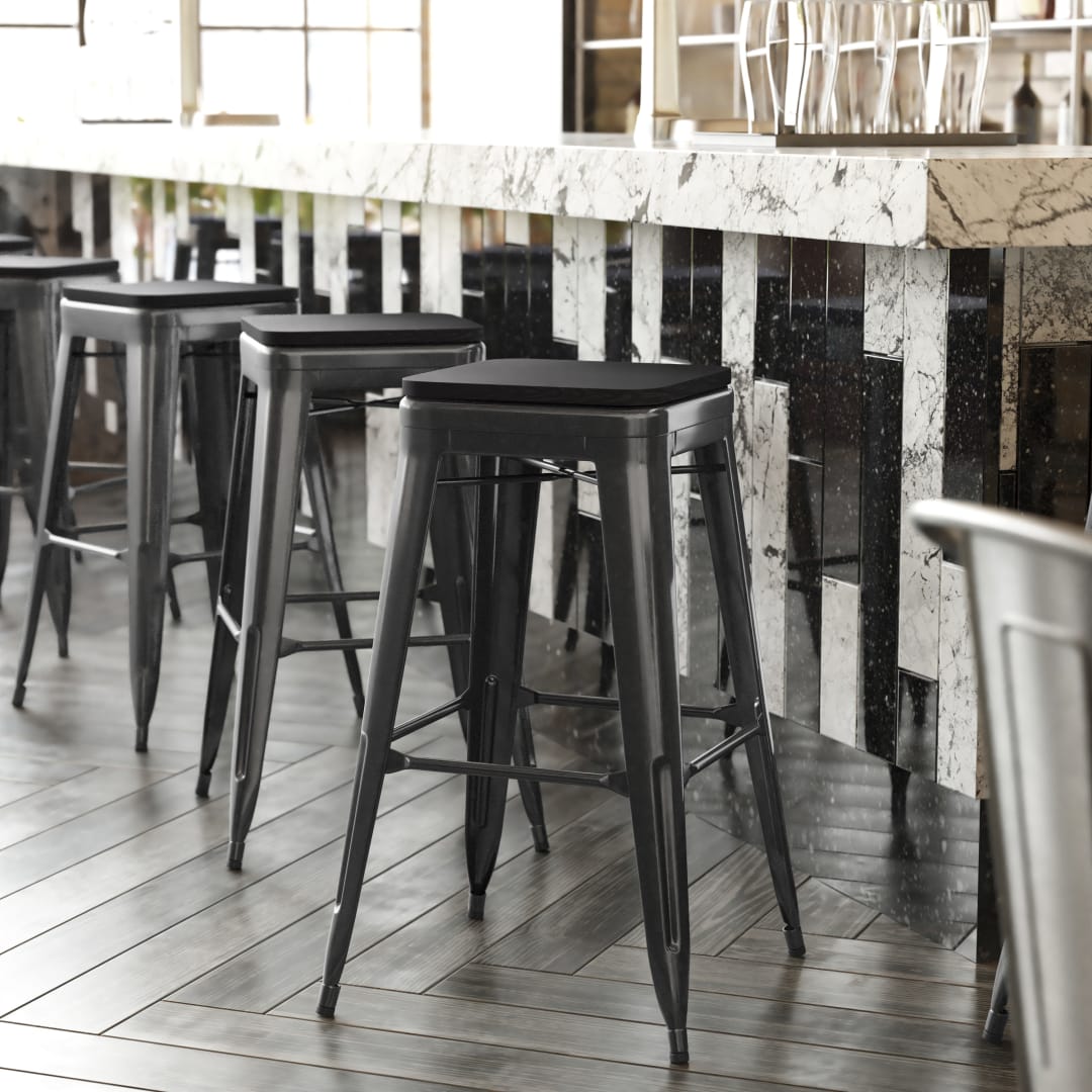 Cierra Set of 4 Commercial Grade 30" High Backless Black Metal Indoor Bar Height Stools with Black All-Weather Poly Resin Seats