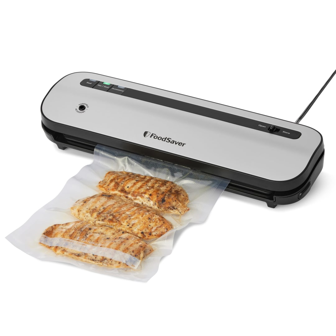 FoodSaver® Space-Saving Vacuum Sealer, Starter Kit with 12 Precut Bags and 1 Roll, Silver