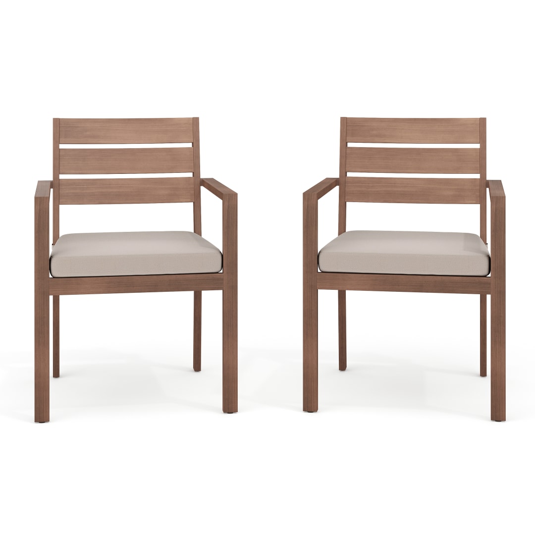 Bedford Set of 2 Indoor-Outdoor Stackable Patio Dining Armchairs with Brown Brushed Woodgrain Aluminum Finish and Cream All-Weather Seat Cushions