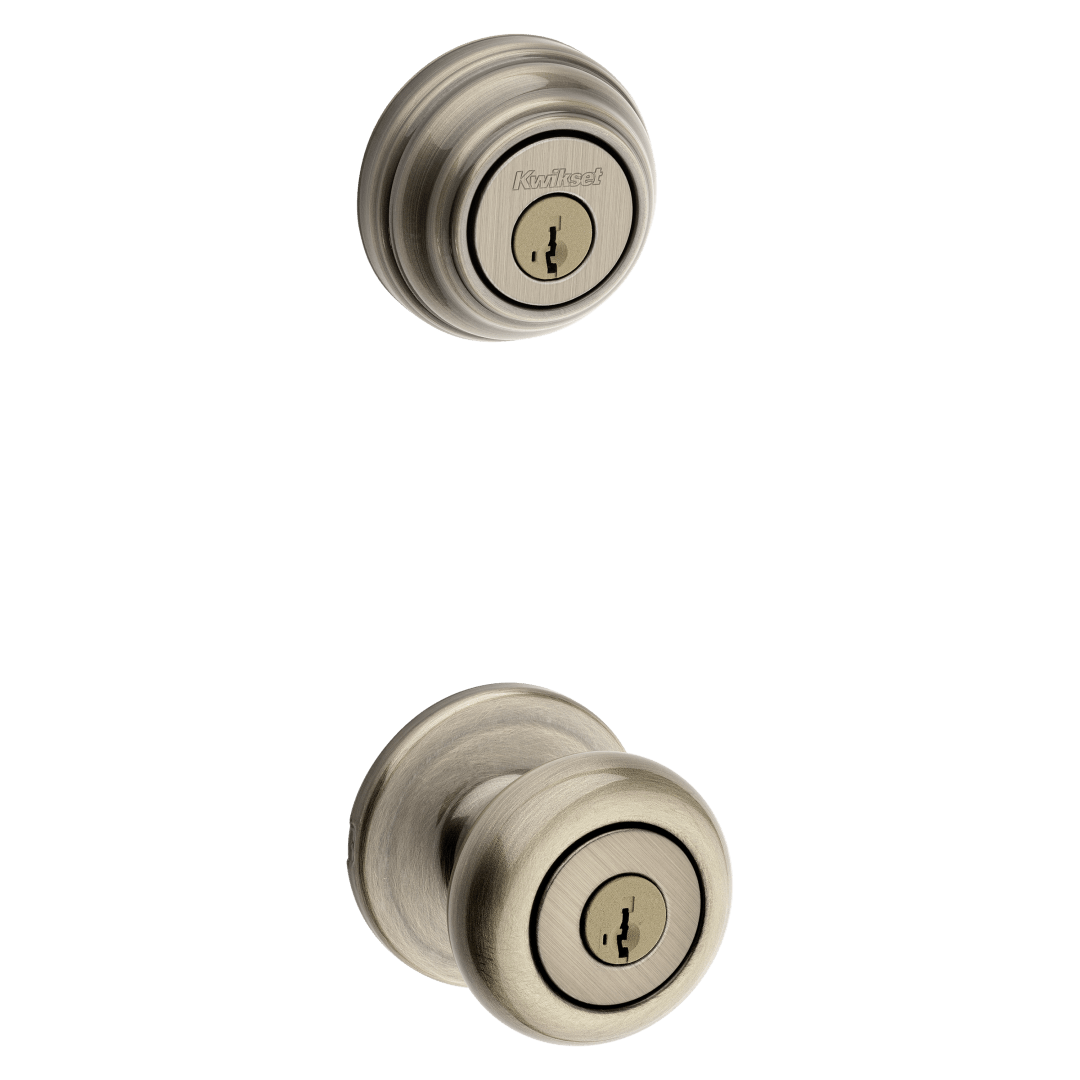991 Juno Keyed Entry Knob and Single Cylinder Deadbolt Combo Pack featuring SmartKey Security™ in Antique Brass