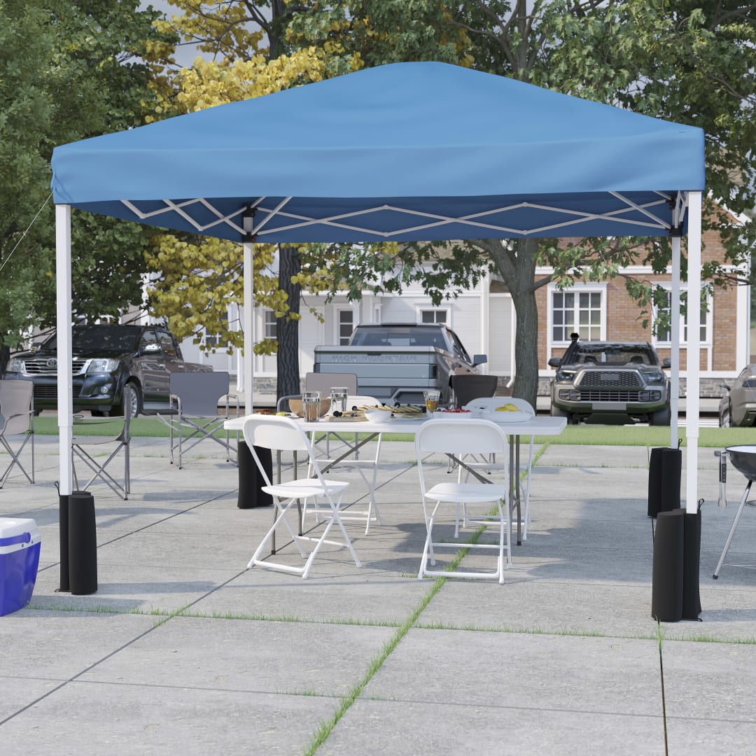 Otis Portable Tailgate/Event Tent Set-10'x10' Wheeled Blue Pop Up Canopy Tent, 6-Foot Bi-Fold Table, 4 White Folding Chairs