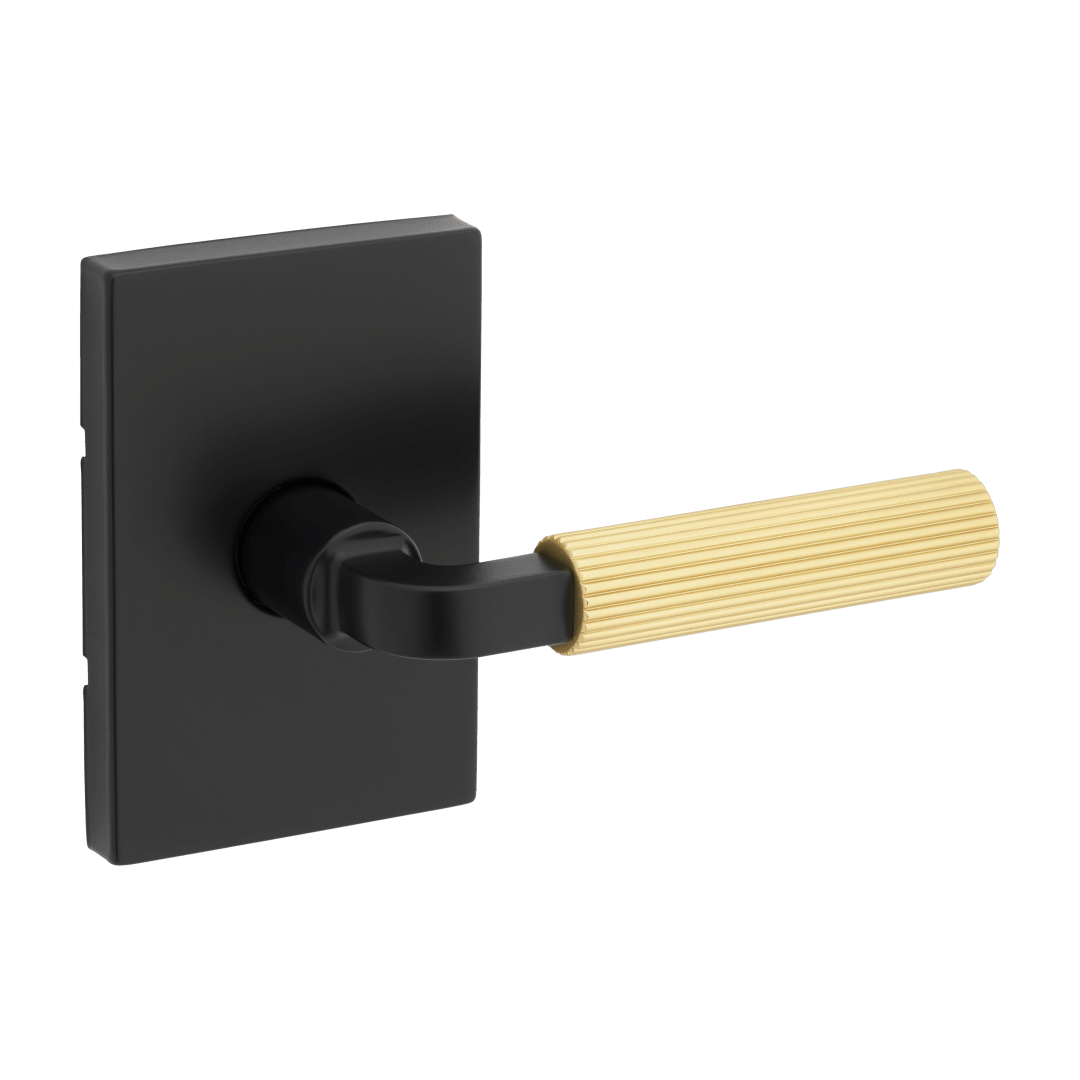Mirada Reeded Hall/Closet Lever w/ Rectangular Rose in Matte Black & Satin Brass
