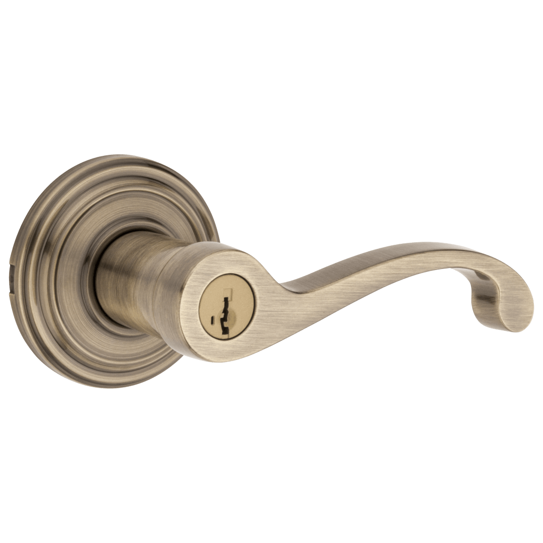 Commonwealth Keyed Entry Lever featuring SmartKey Security™ in Antique Brass