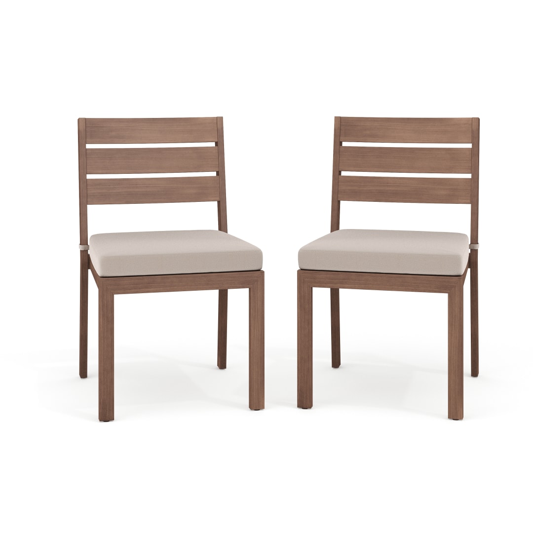 Bedford Set of 2 Indoor-Outdoor Stackable Patio Dining Chairs with Brown Brushed Woodgrain Aluminum Finish and Cream All-Weather Seat Cushions