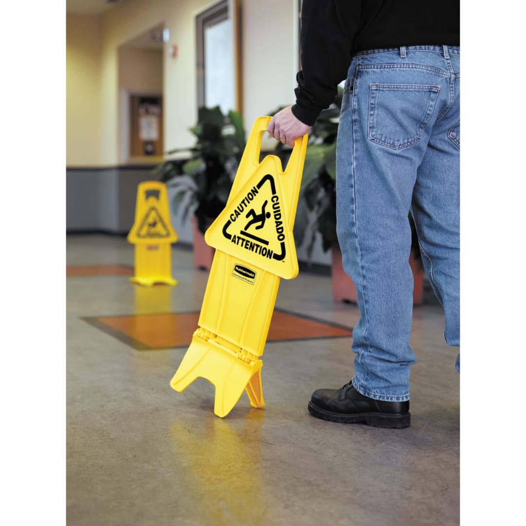 Rubbermaid Commercial Products Multilingual "Caution" Stable Safety Sign, 2 Sided, 26", Yellow