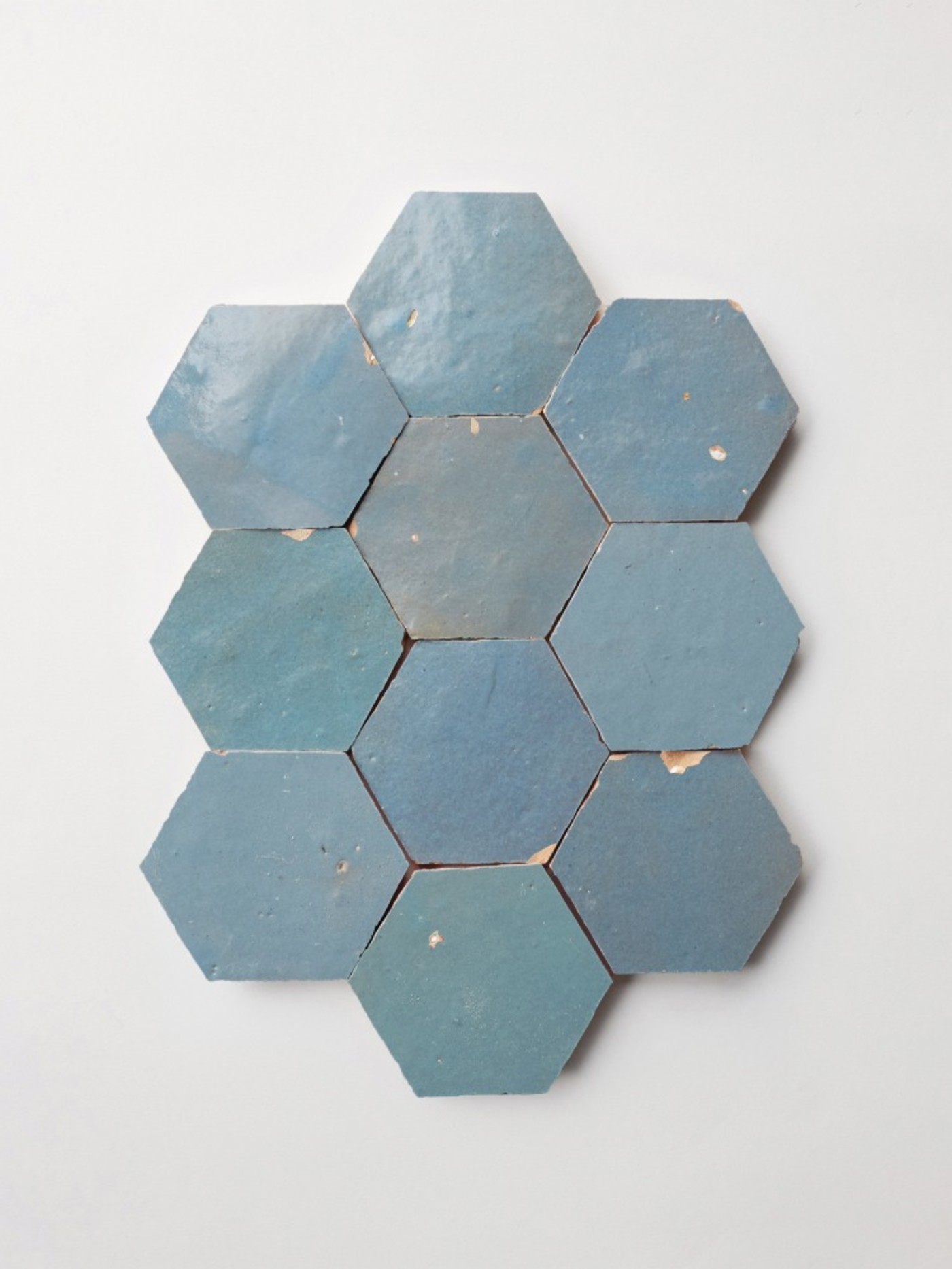 blue hexagon tiles on a white background.