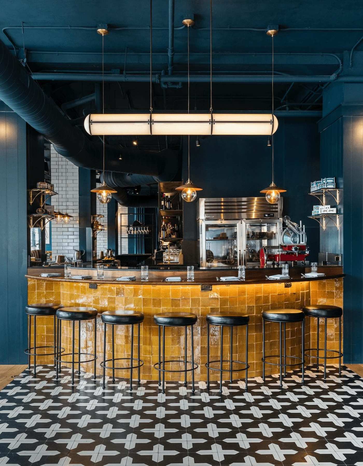 a black and white checkered floor in a restaurant.