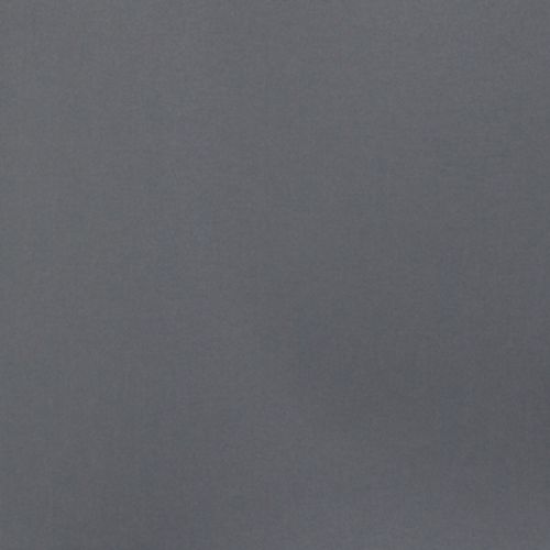 Smooth matte gray wall filling the frame, unadorned and uniformly lit; appearing static and featureless, suggesting a minimally furnished interior with soft, diffuse ambient lighting.