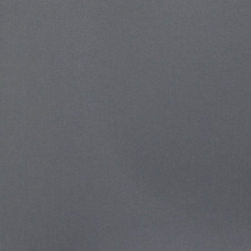 Smooth matte gray wall filling the frame, unadorned and uniformly lit; appearing static and featureless, suggesting a minimally furnished interior with soft, diffuse ambient lighting.