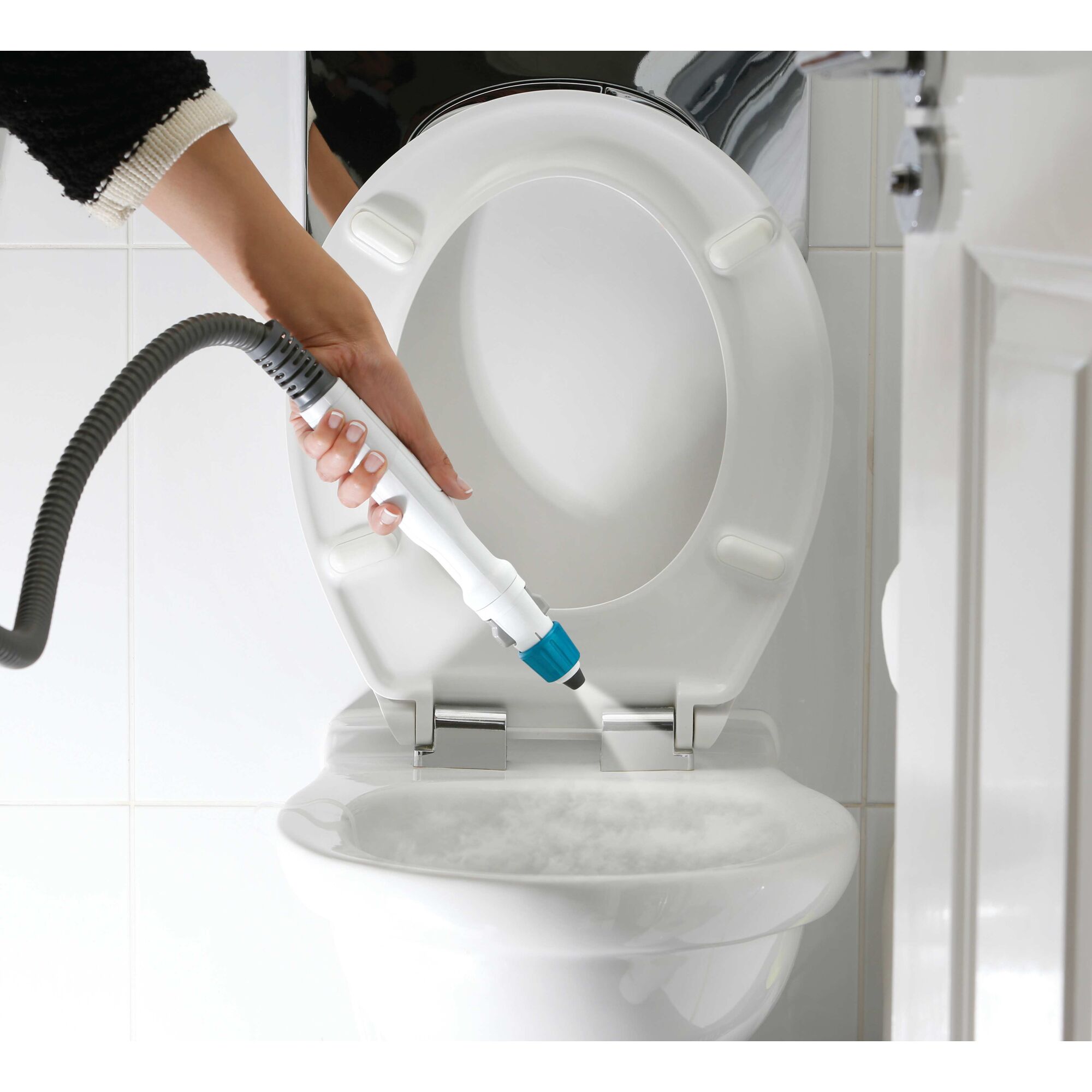 7 in 1 steam mop with steamglove handheld steamer being used in the washroom.