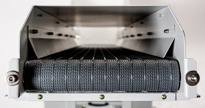 Keeps waste in place as it travels to the waste bin.