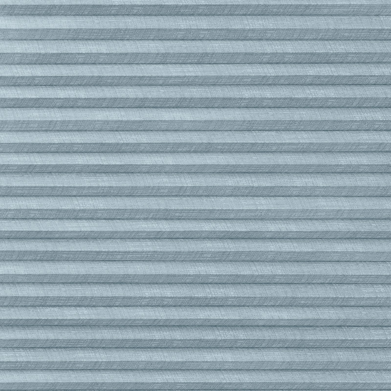 Light-blue pleated cellular shade, horizontally folded and textured, fully lowered and closed, softly filtering daylight across a neutral interior window with no visible view.