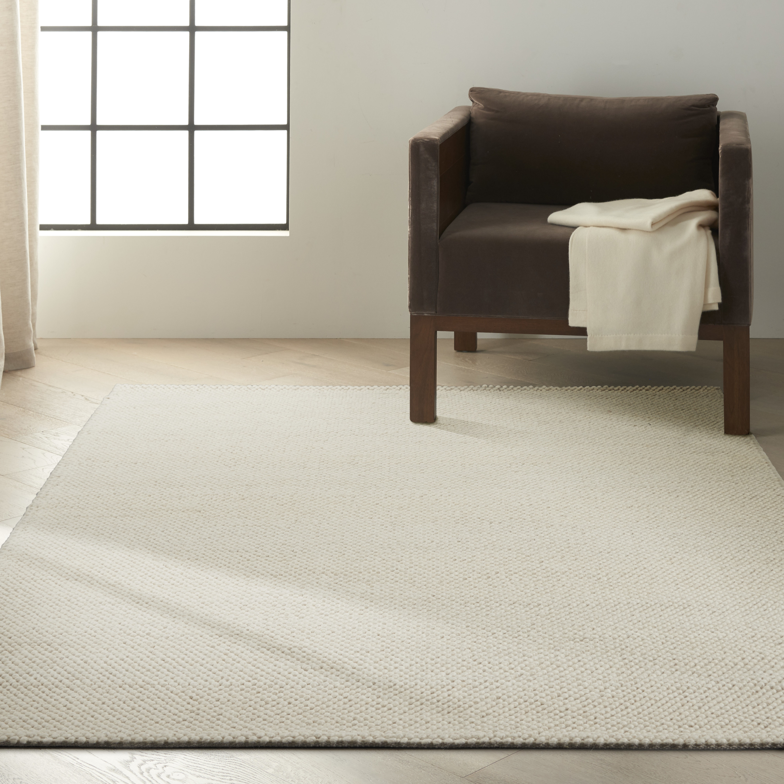 Calvin Klein Textured Dots 5'3" x 7'3" Cream Beach Indoor Rug
